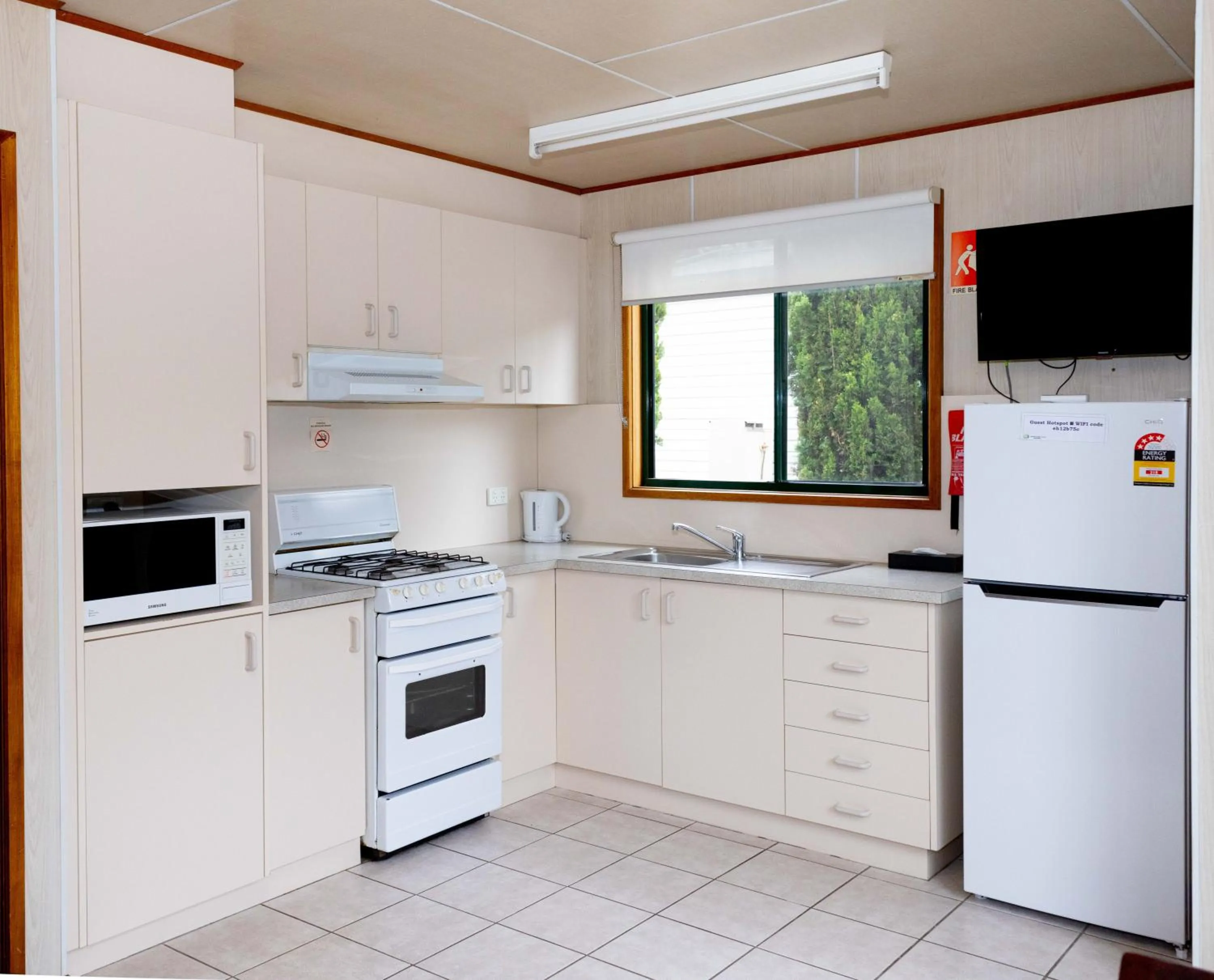 kitchen in Airport Tourist Village Melbourne