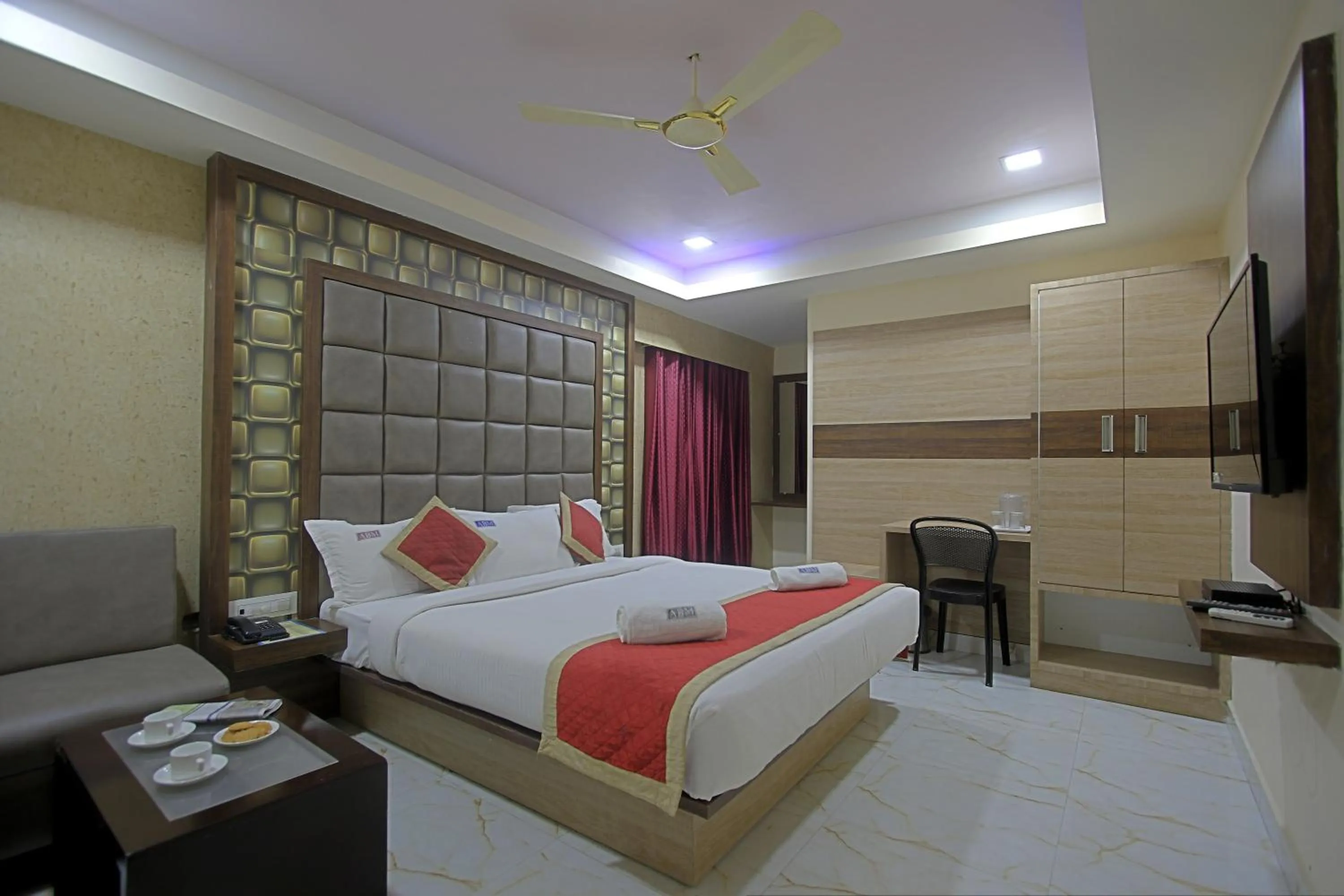 Bed in ABM Express Inn