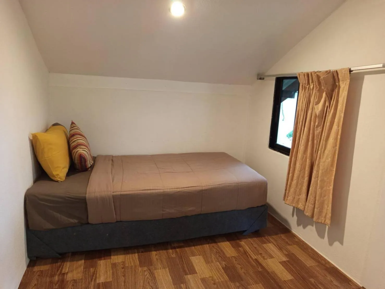 Bed in Faye Orchid Garden Resort