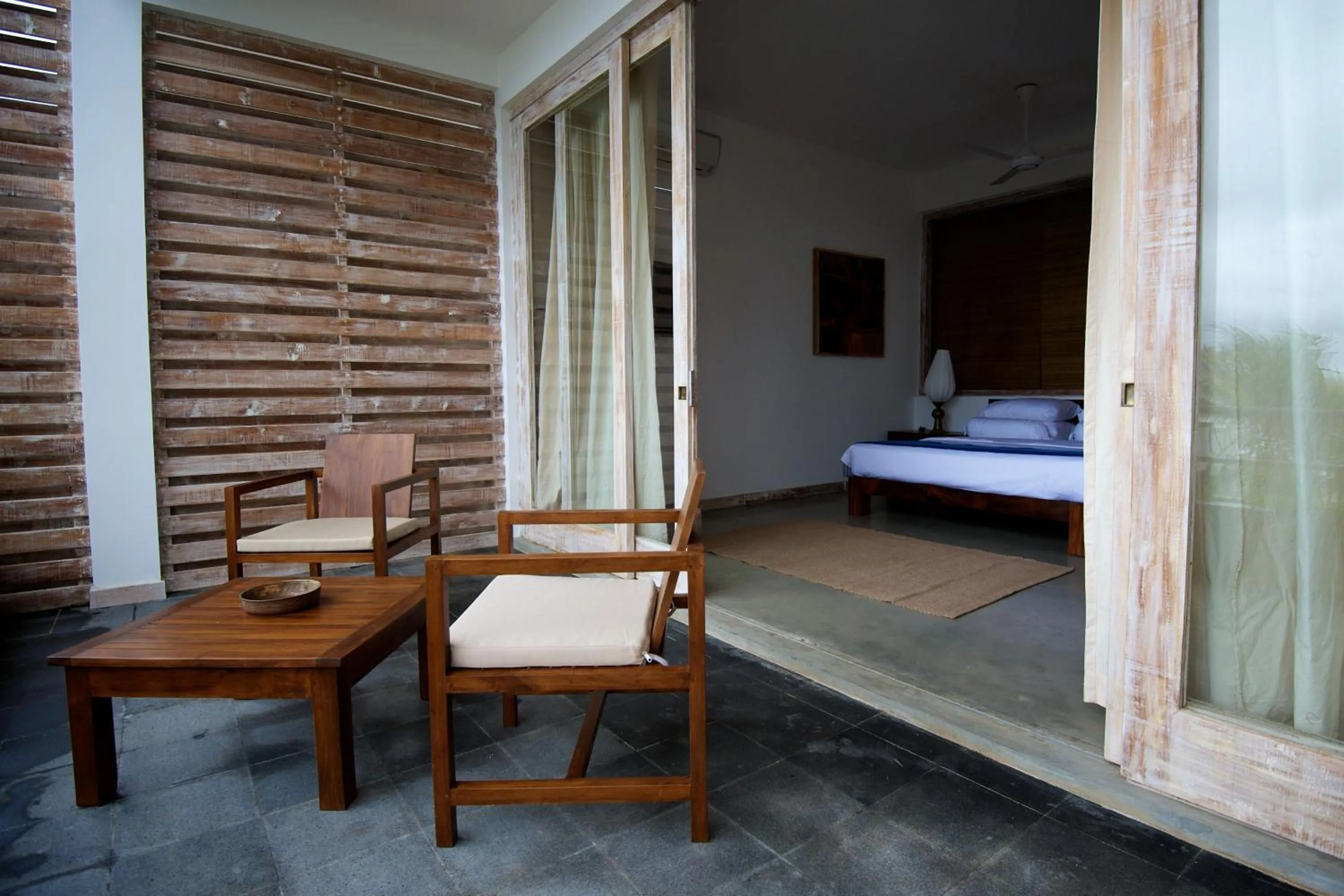 Patio, Bed in Roman Beach Hotel
