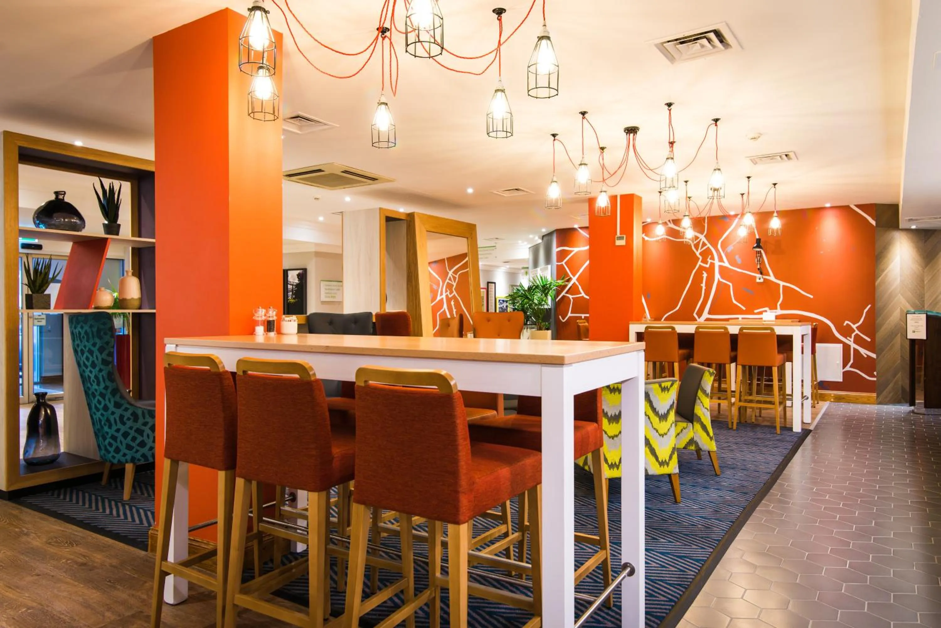 Lounge or bar in Holiday Inn Stoke on Trent M6 Jct15 by IHG