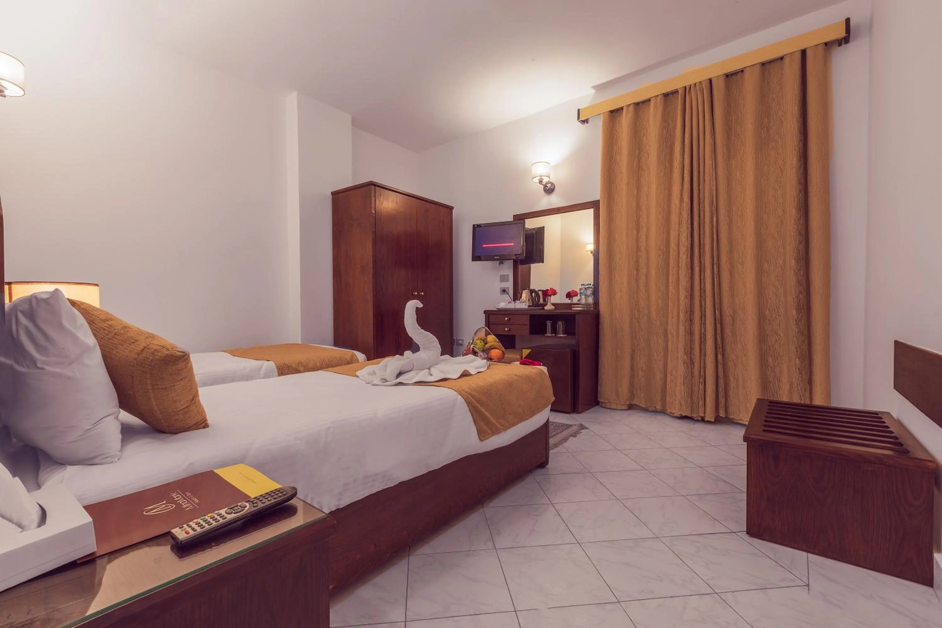 Bed in MinaMark Beach Resort for Families and Couples Only