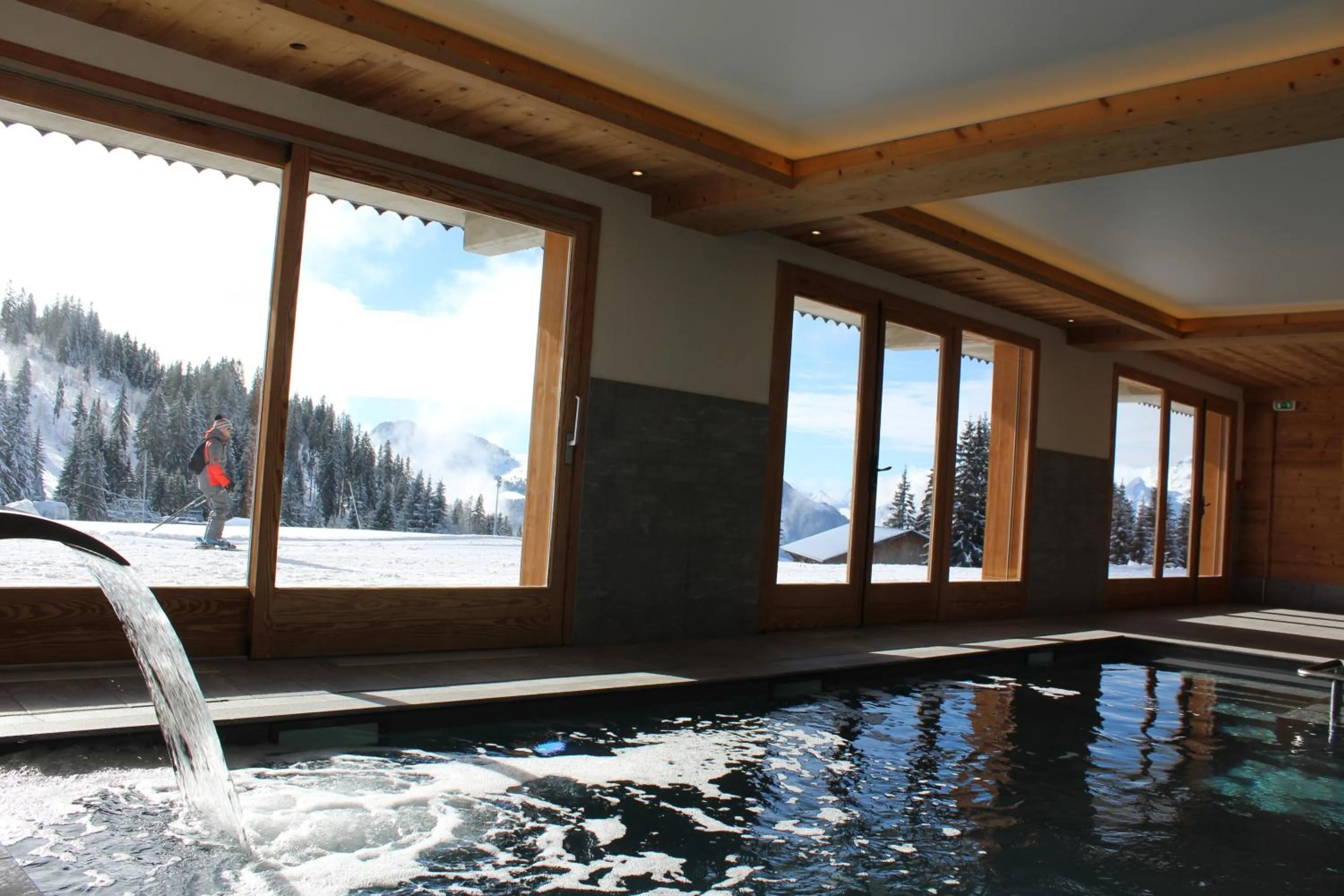 Swimming pool in Hôtel Restaurant "Les Sapins" Wellness & Gourmet