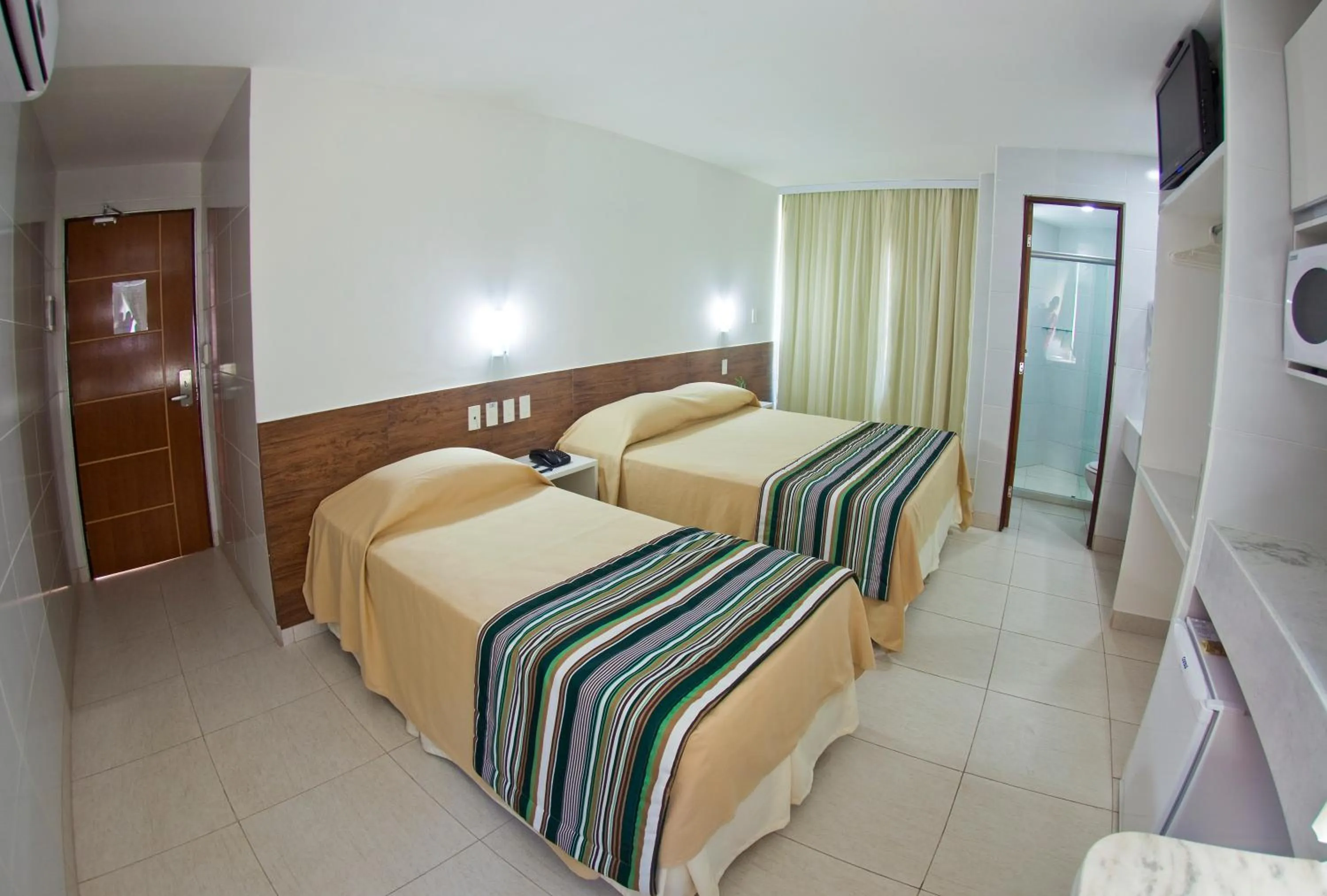Bathroom, Bed in Hotel Corais de Tambau