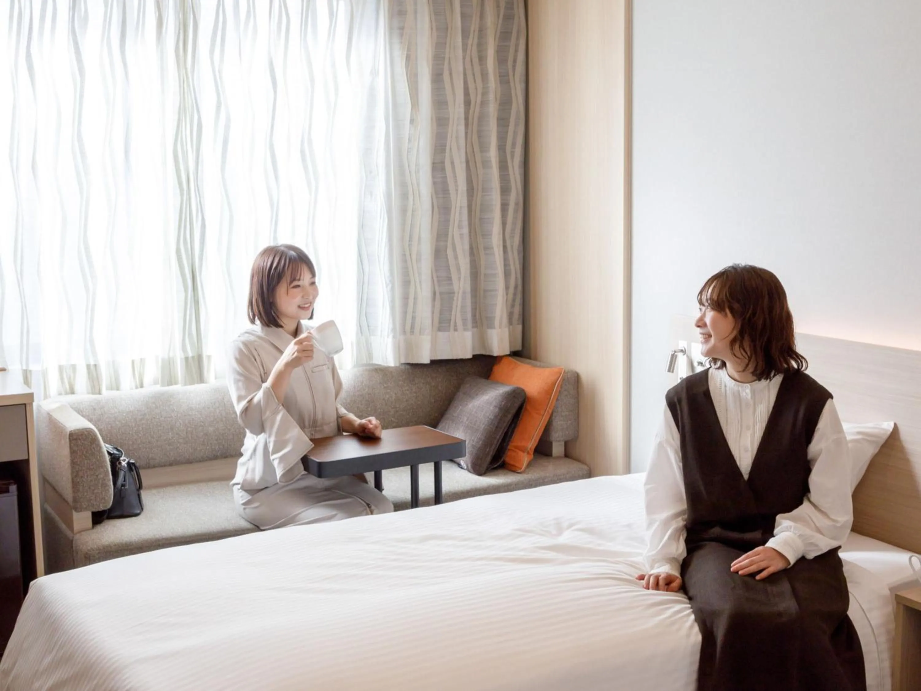Photo of the whole room, Bed in Nishitetsu Hotel Croom Nagoya