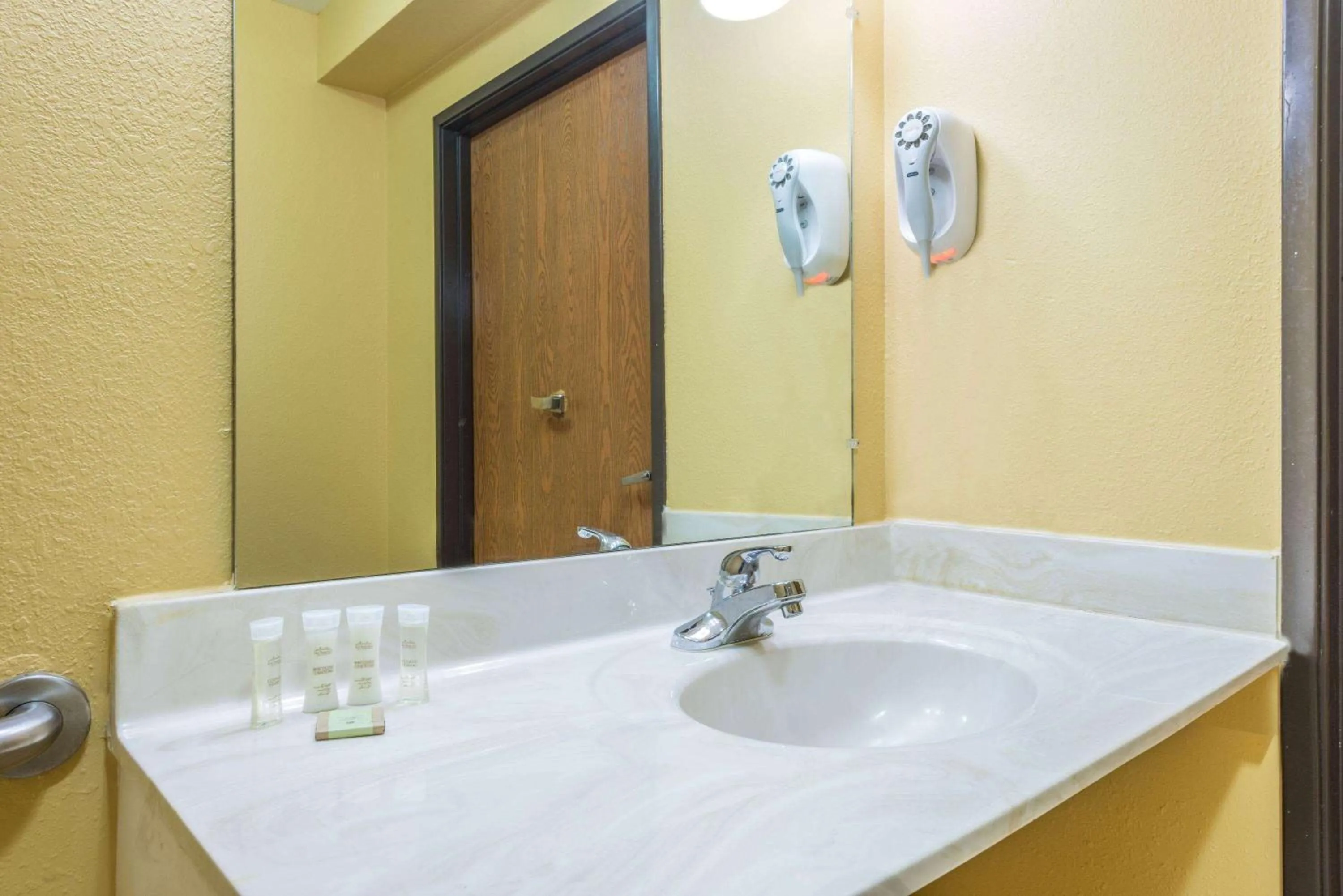 Photo of the whole room in Super 8 by Wyndham Troy IL/St. Louis Area