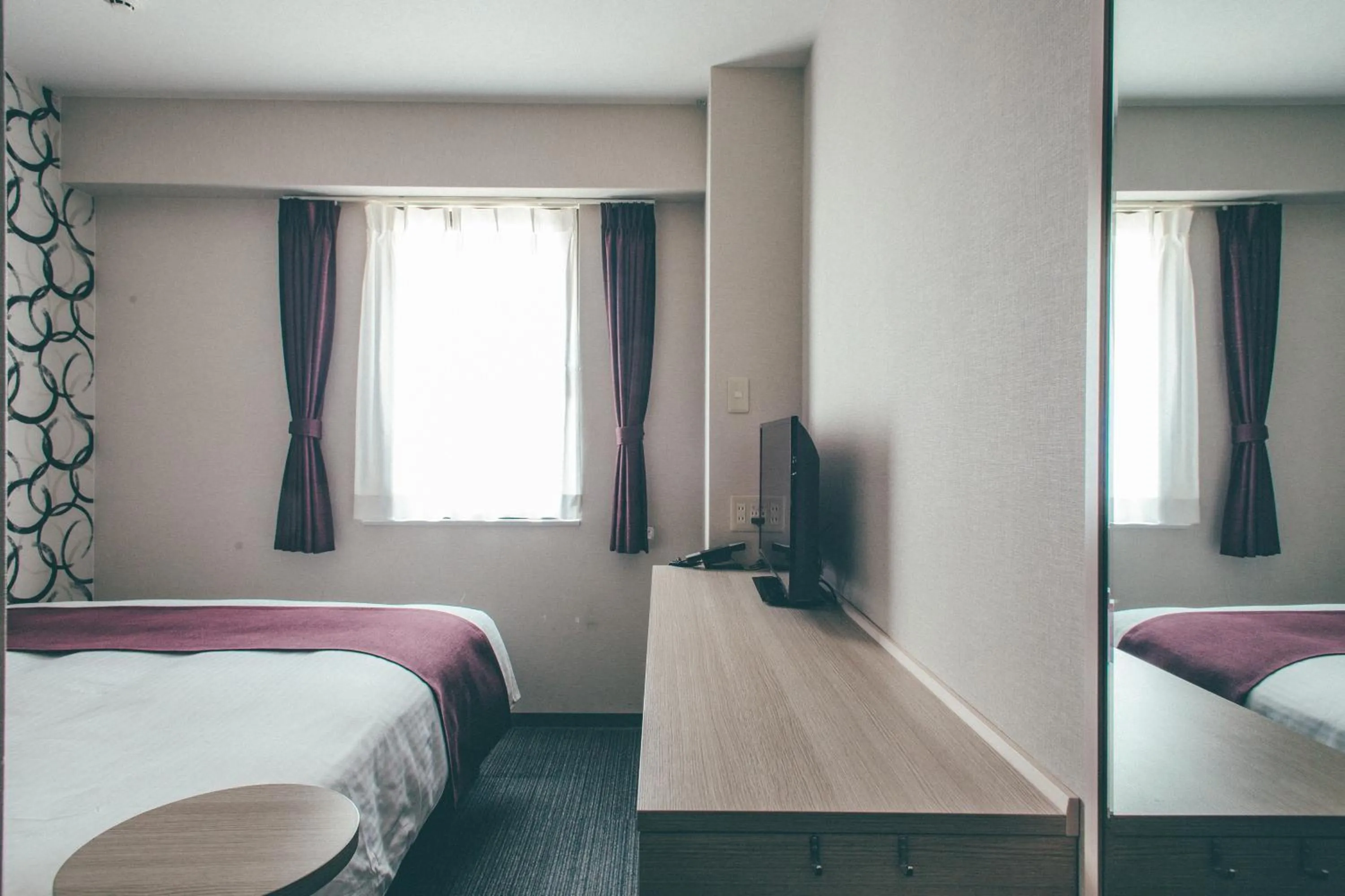 Bed in Kuretake Inn Nankai Sakai-Ekimae