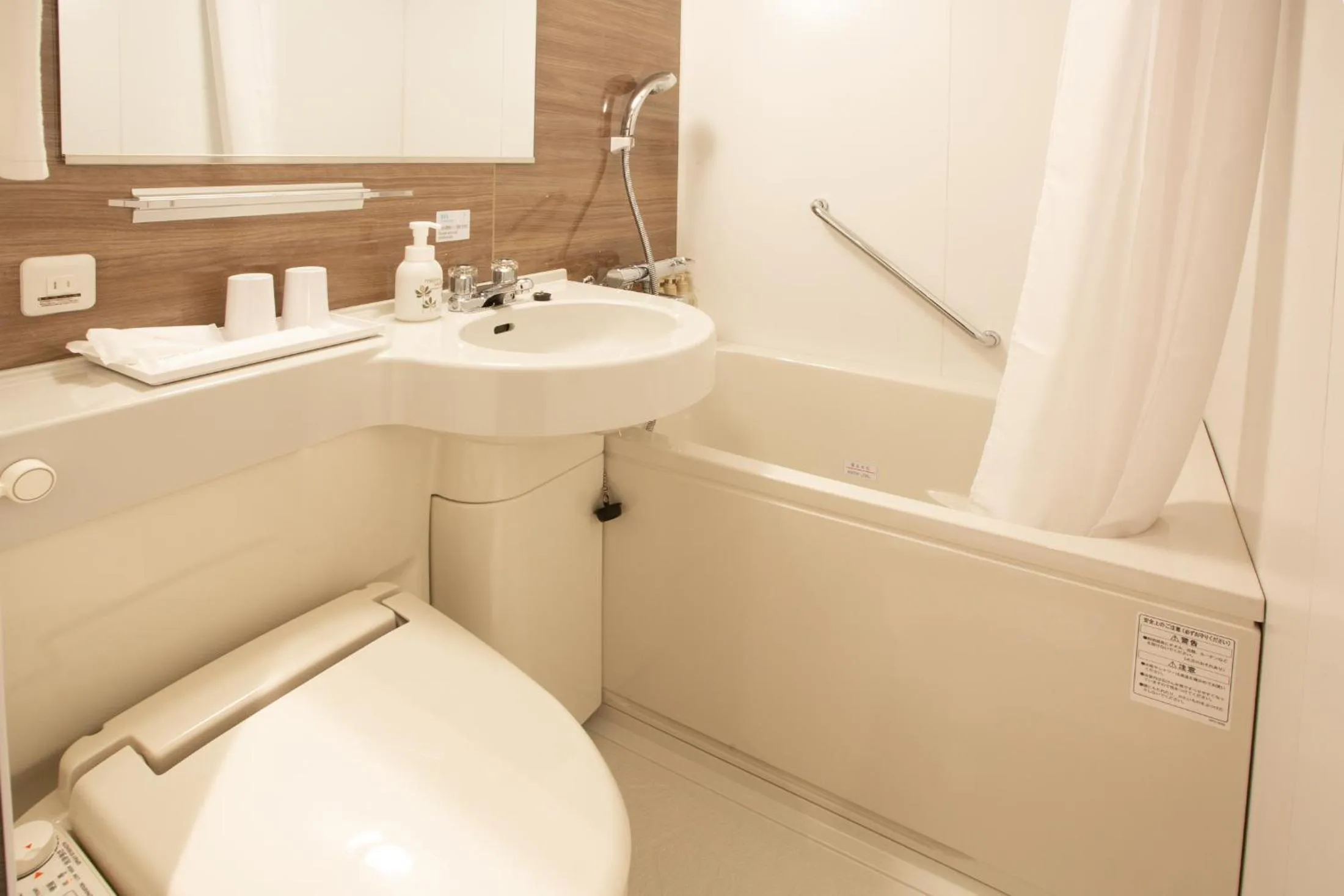 Shower in Kuretake Inn Osaka Midousuji Hommachi