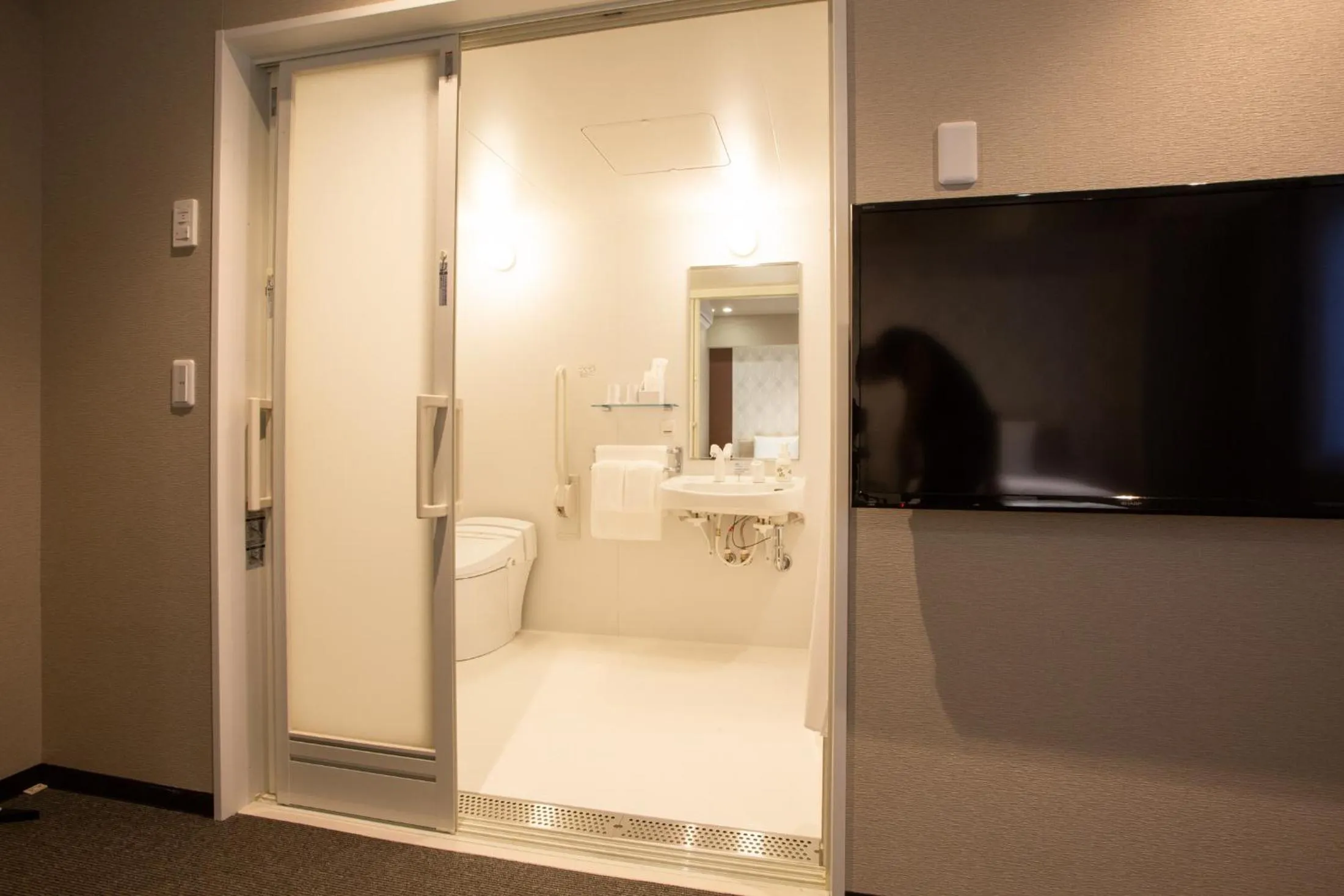 Shower in Kuretake Inn Osaka Midousuji Hommachi