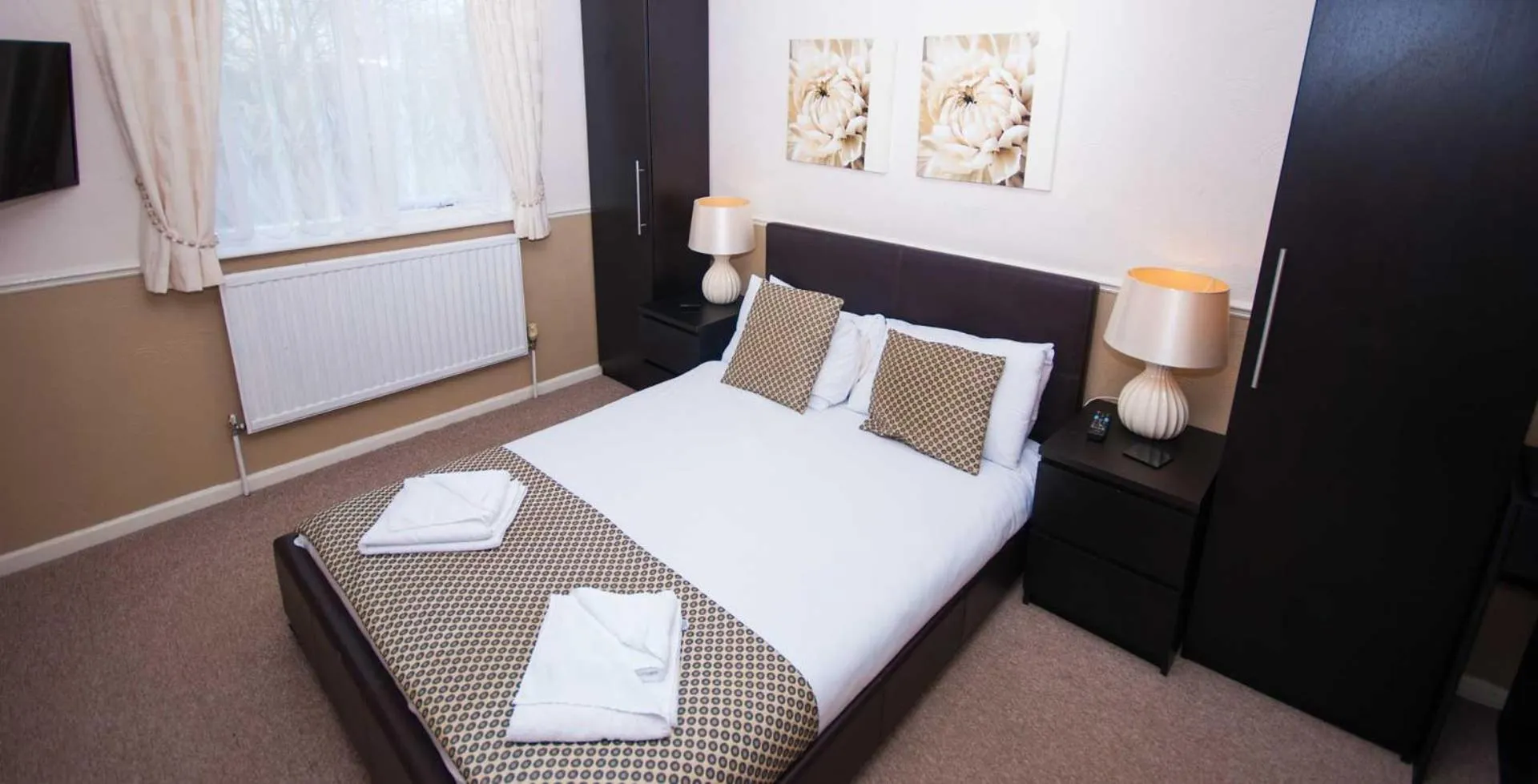 Communal lounge/ TV room in Somerton Lodge