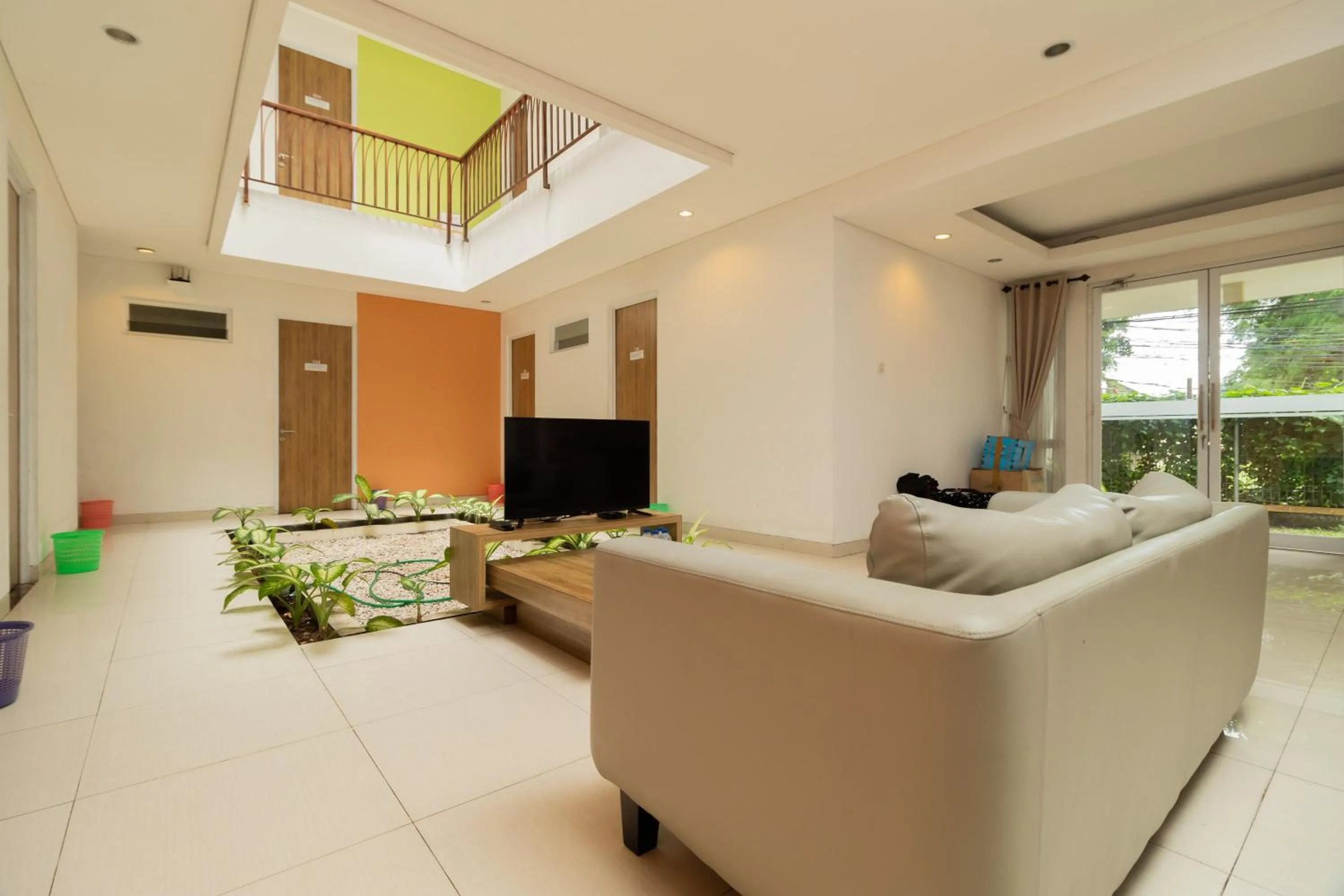 TV and multimedia in RedDoorz Syariah near Prasetya Mulya Cilandak campus