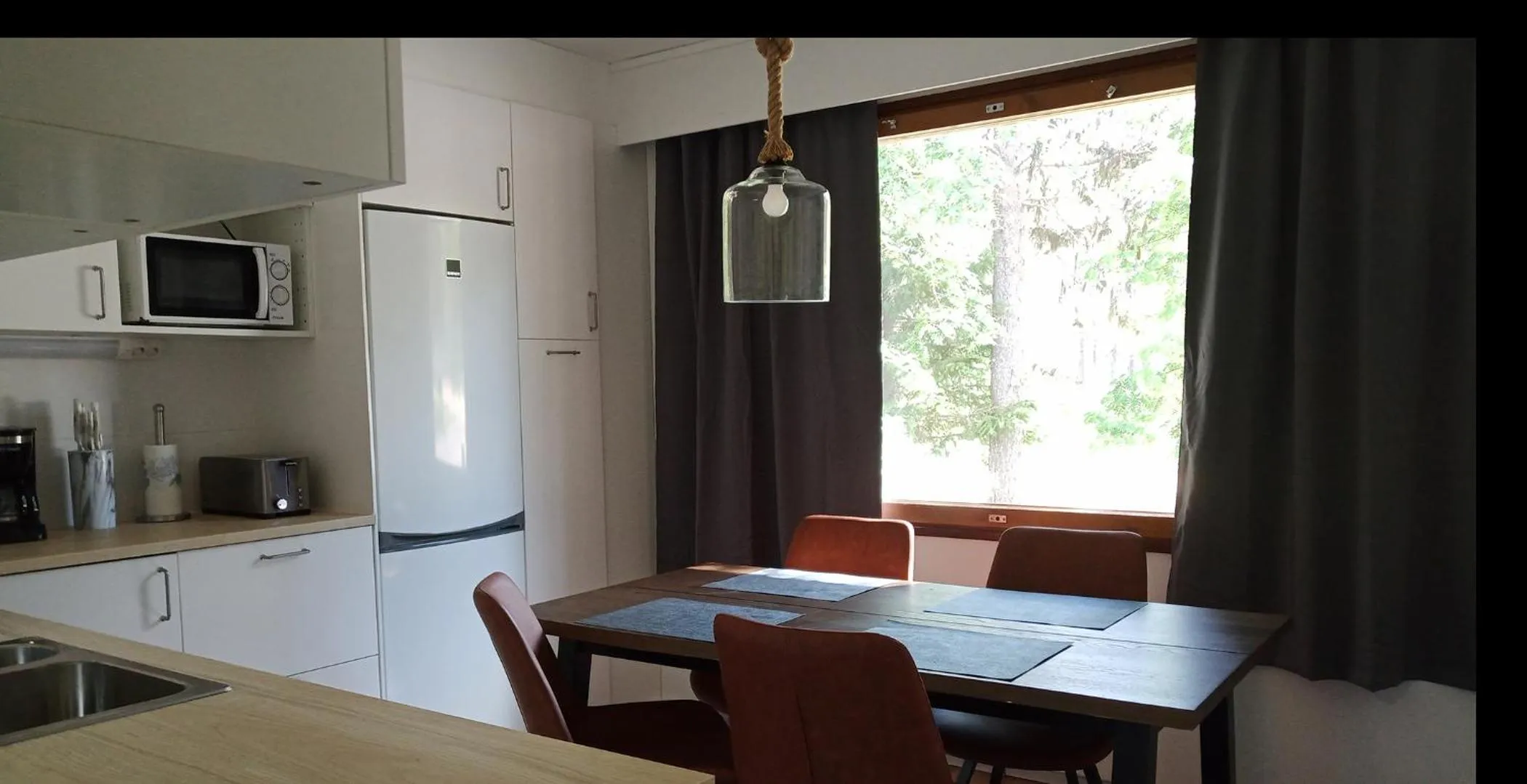 Kitchen or kitchenette in Kuukkeli Apartments Vuotso