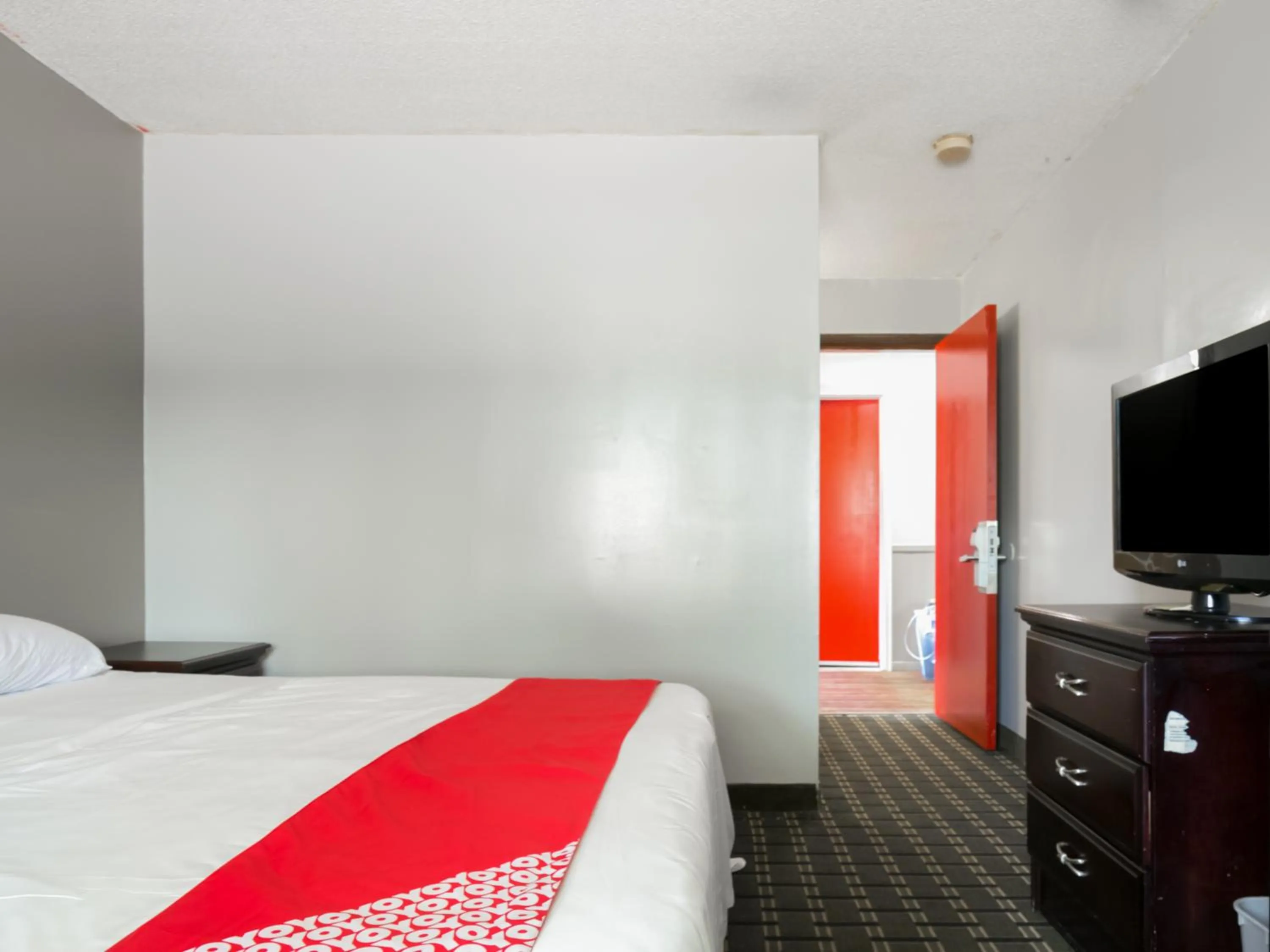 Bedroom in Raceway Inn Darlington By OYO