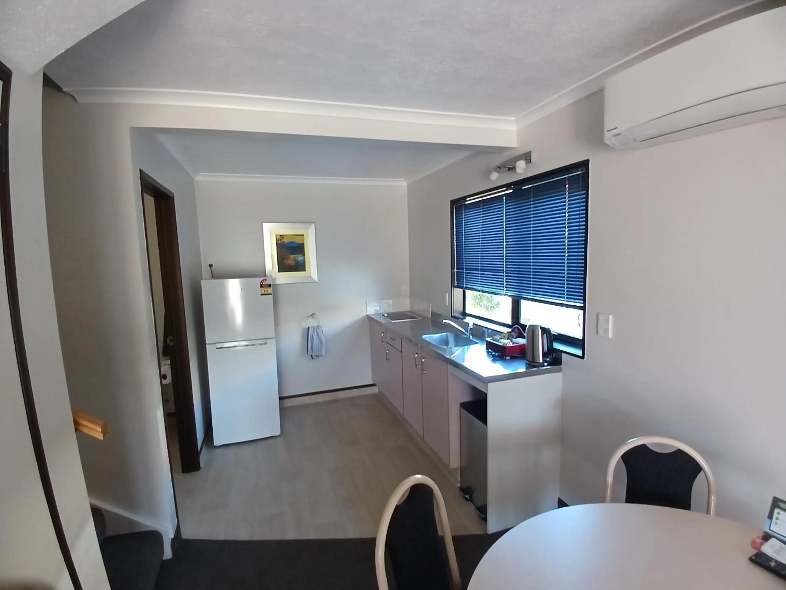 Kitchen or kitchenette in Palm City Motor Inn