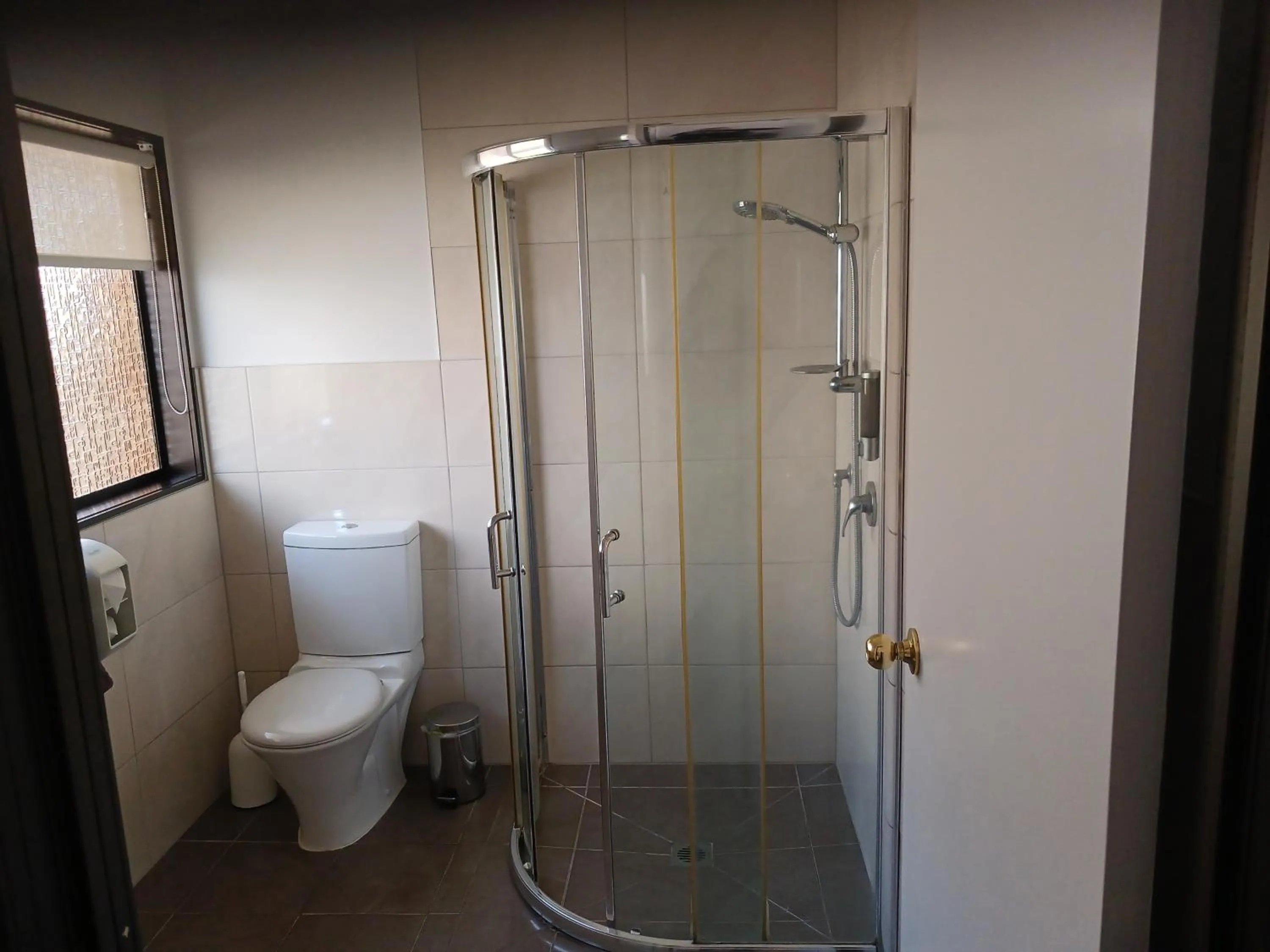 Bathroom in Palm City Motor Inn