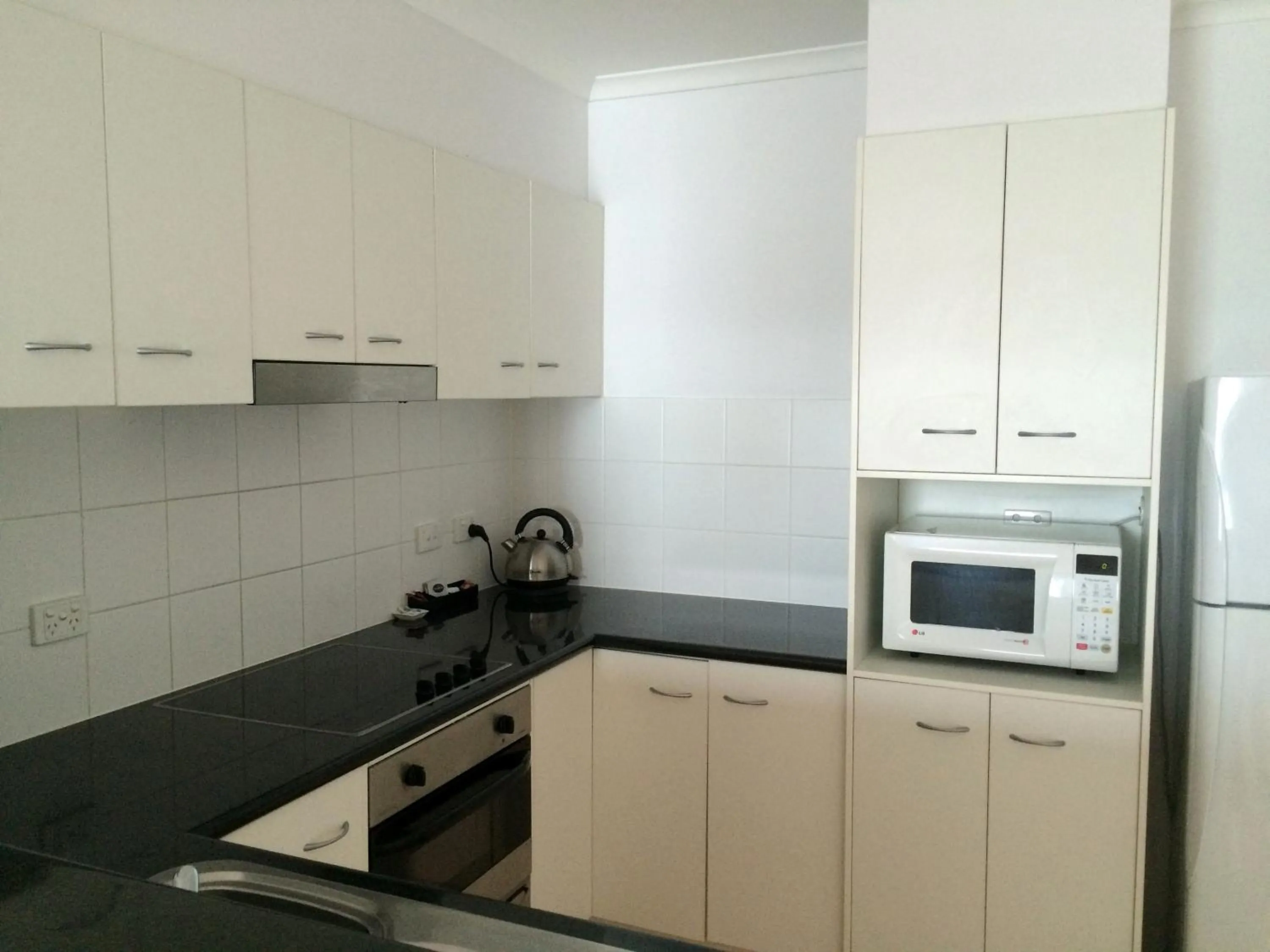 Kitchen or kitchenette in Frisco Apartments