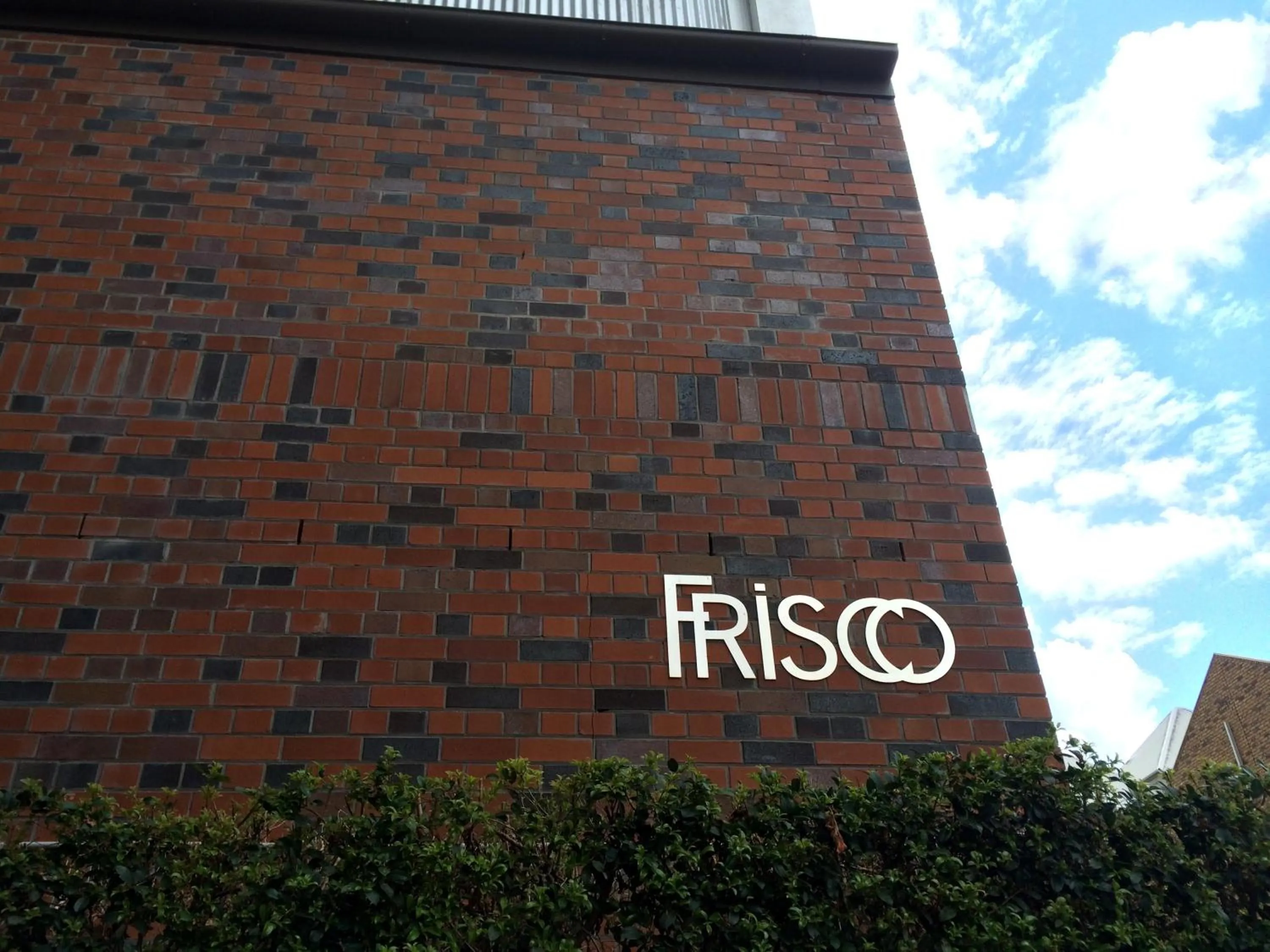 Facade/entrance in Frisco Apartments