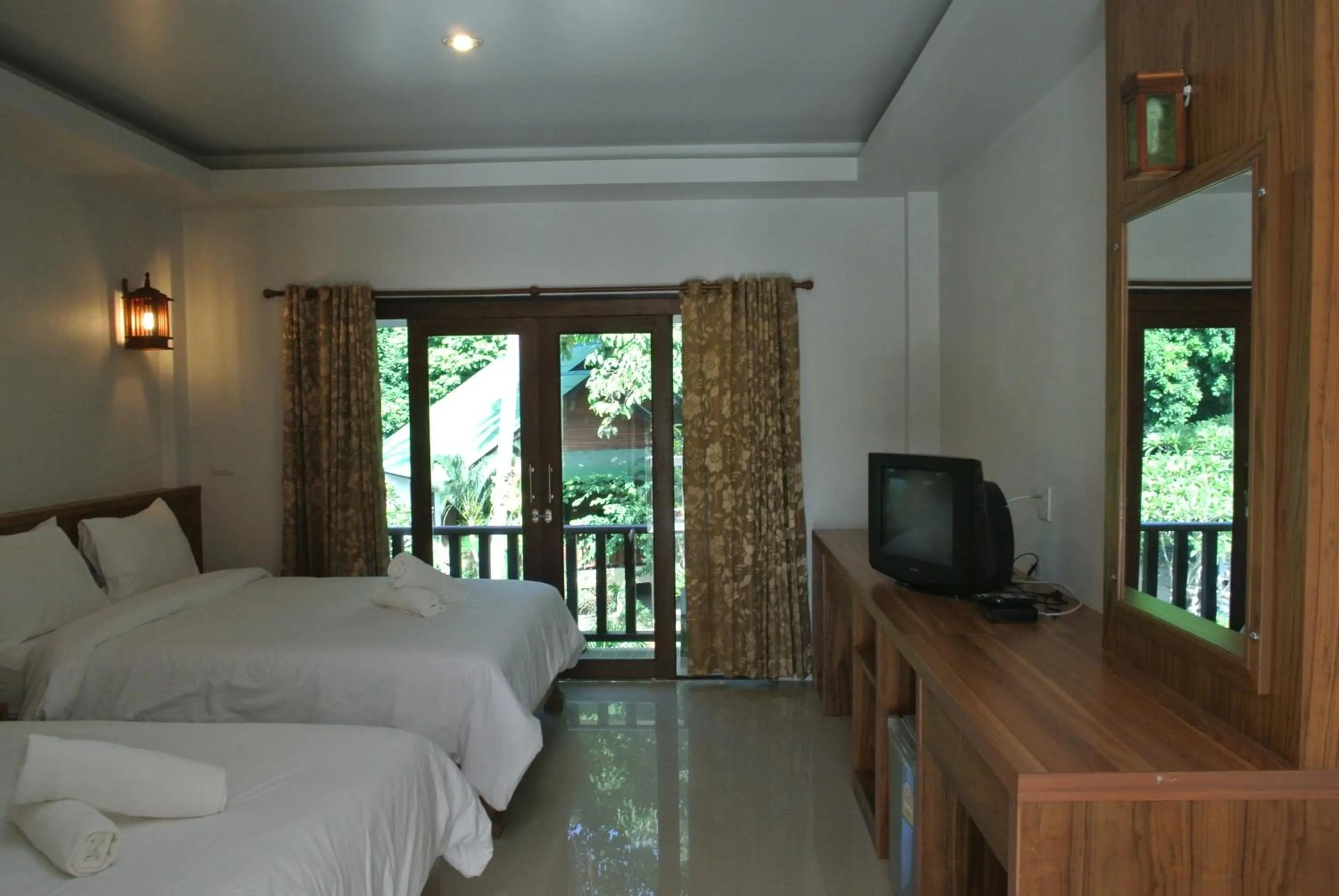 Bed in Mac's Bay Resort