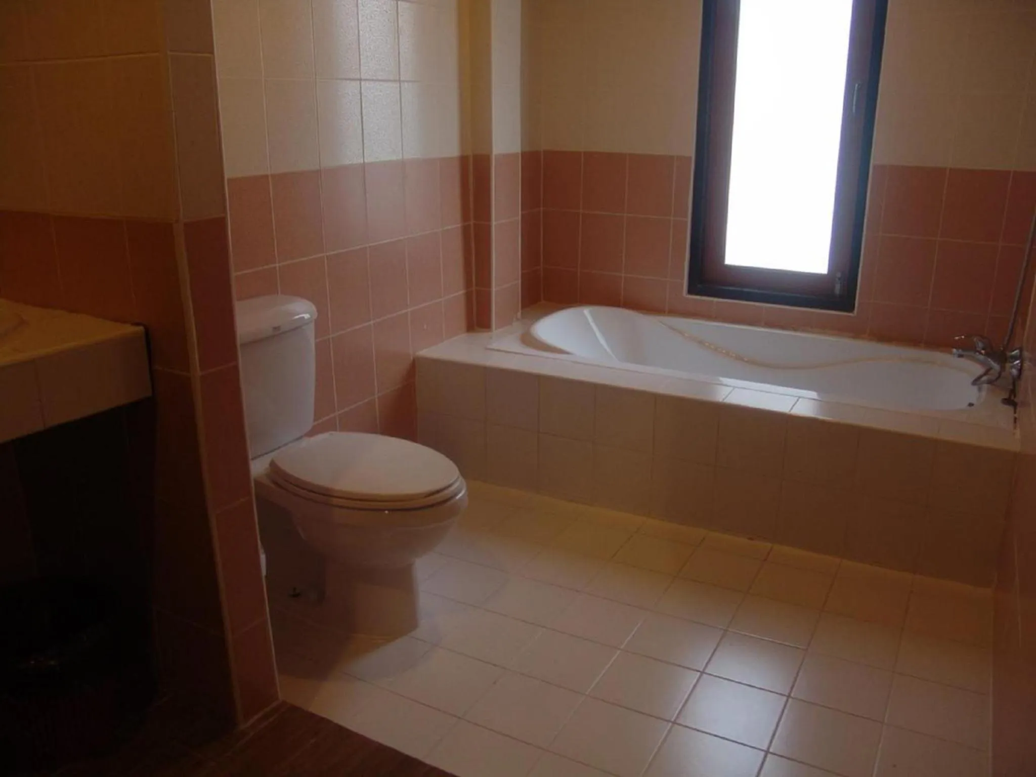 Toilet in Mac's Bay Resort