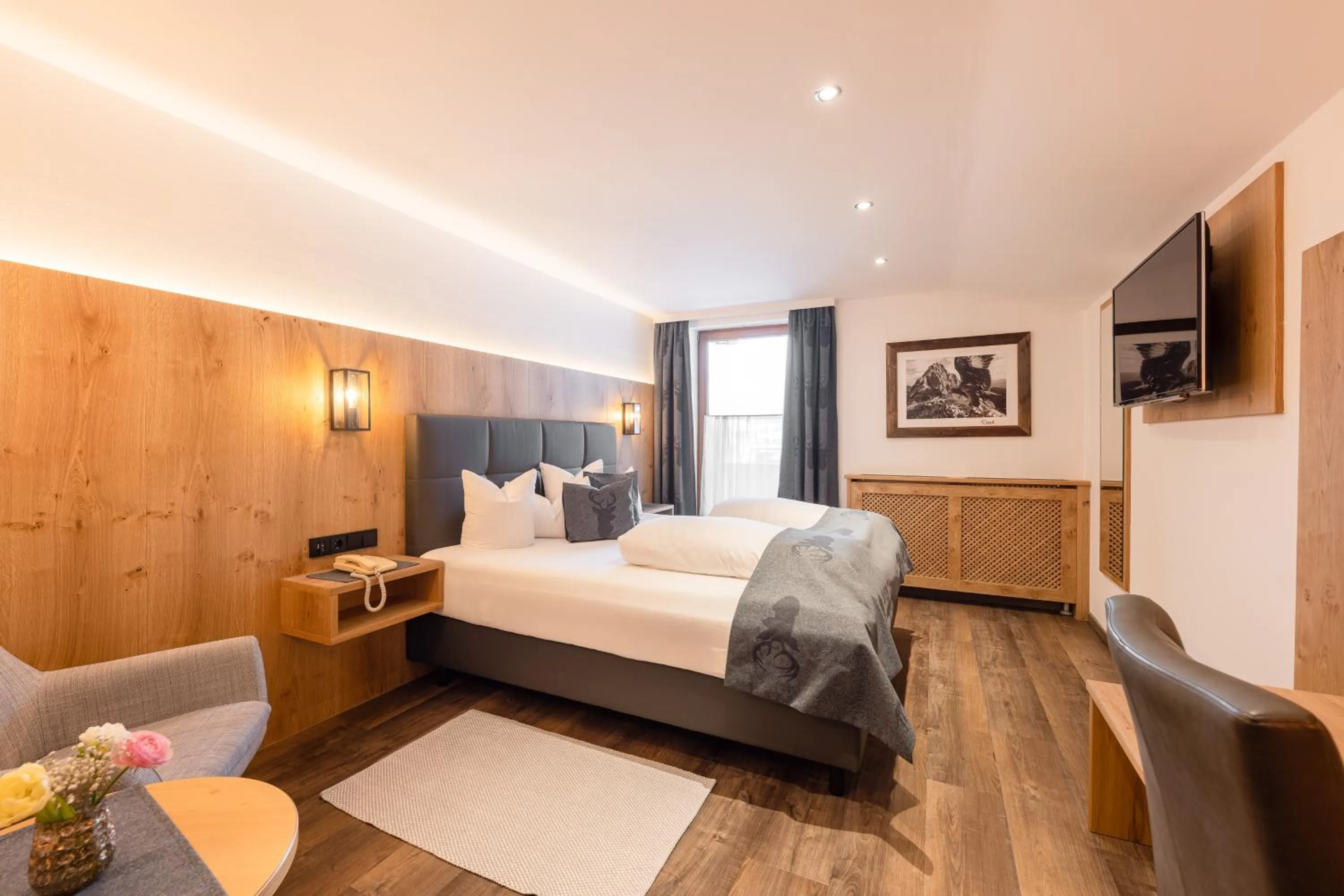 Photo of the whole room, Bed in Hotel Alphof Stubaital