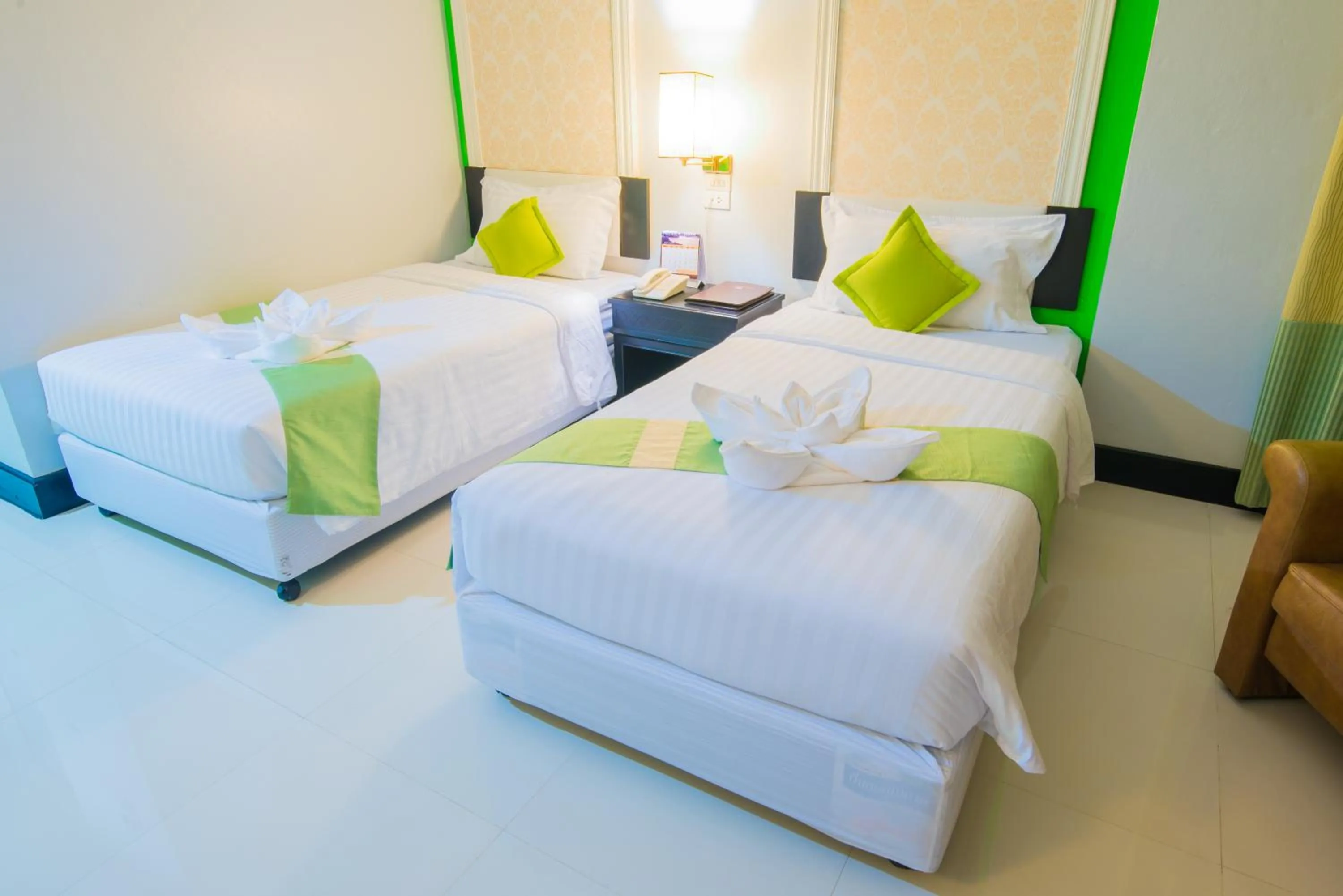 Bed in Asawann Hotel Nongkhai