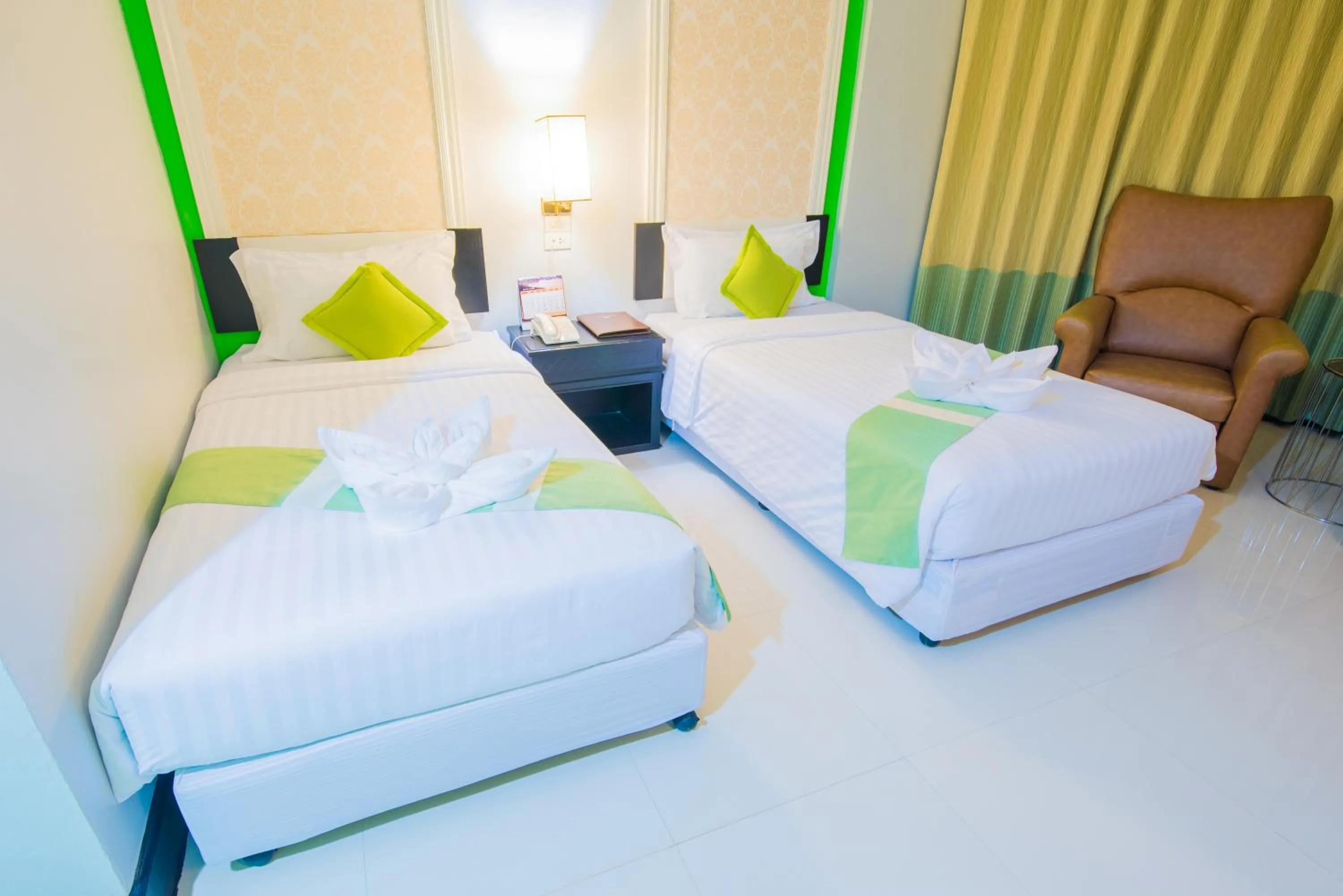 Bed in Asawann Hotel Nongkhai