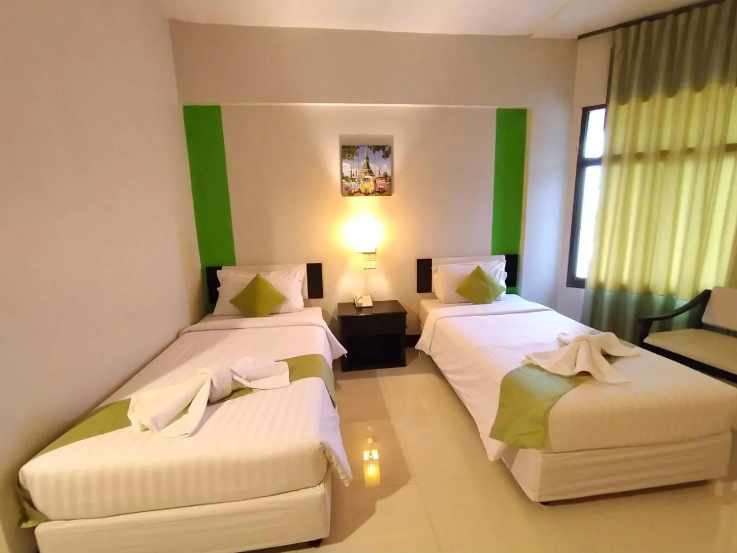 Bed in Asawann Hotel Nongkhai