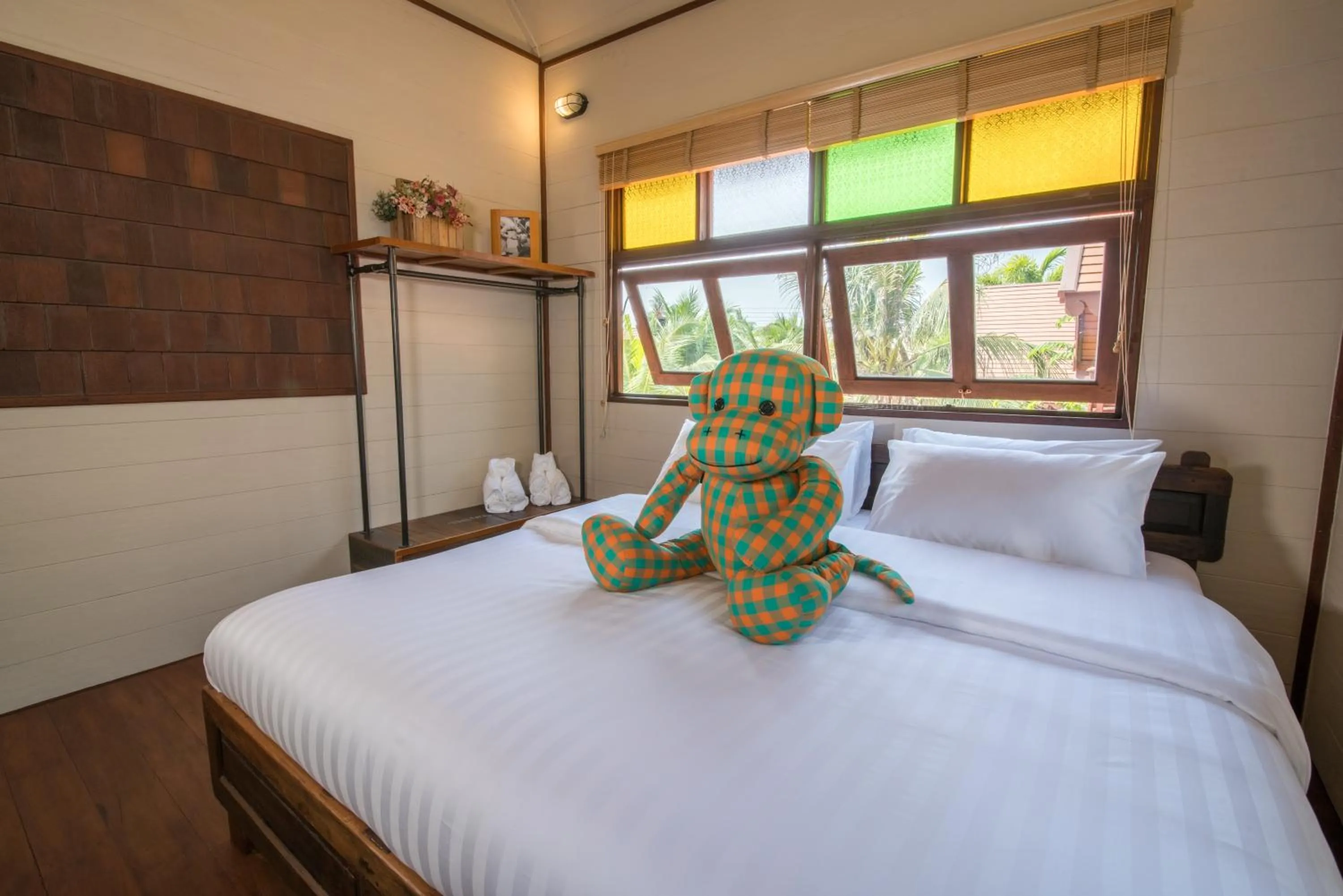 Bed in Suankaew Art Cottage