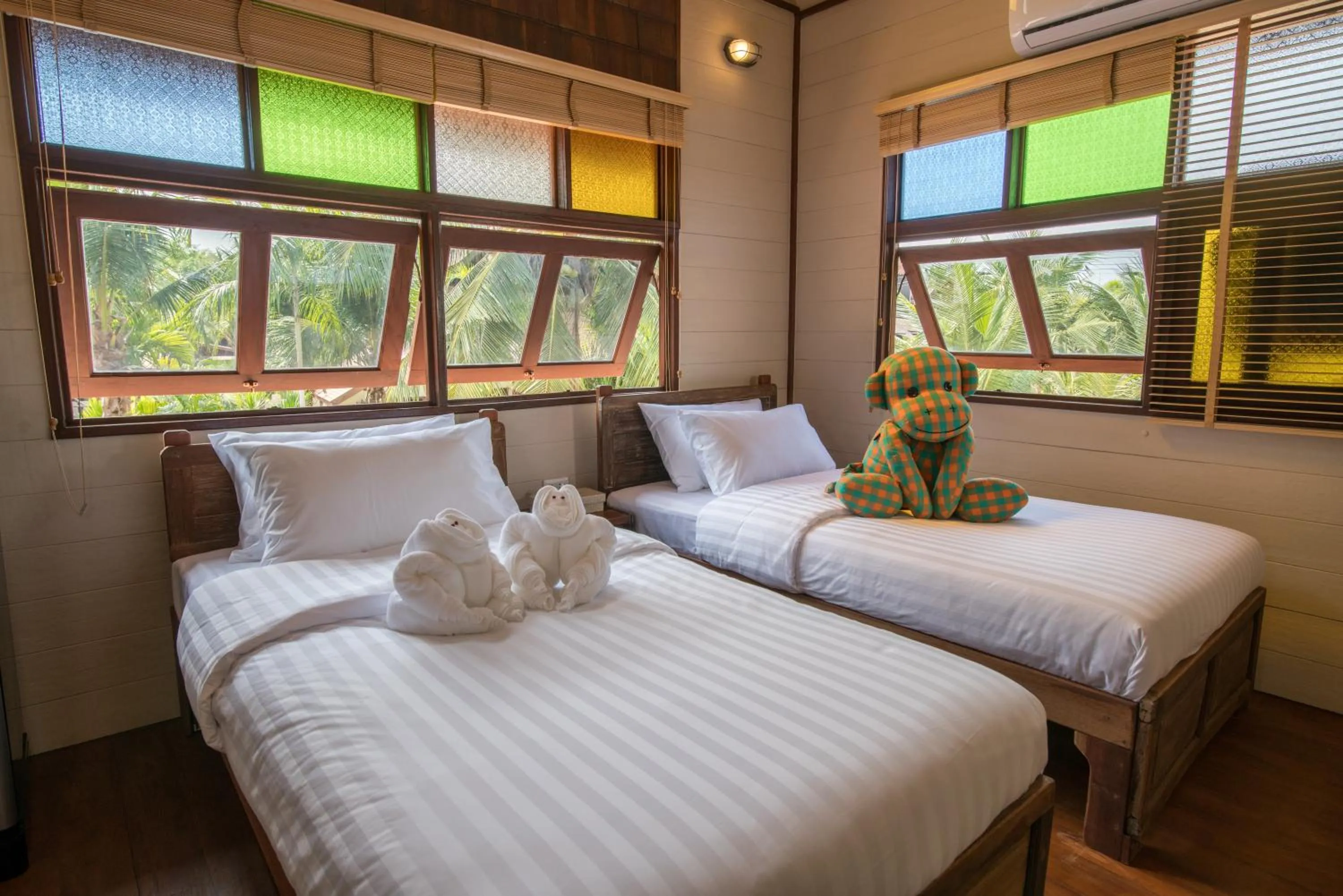 Bed in Suankaew Art Cottage