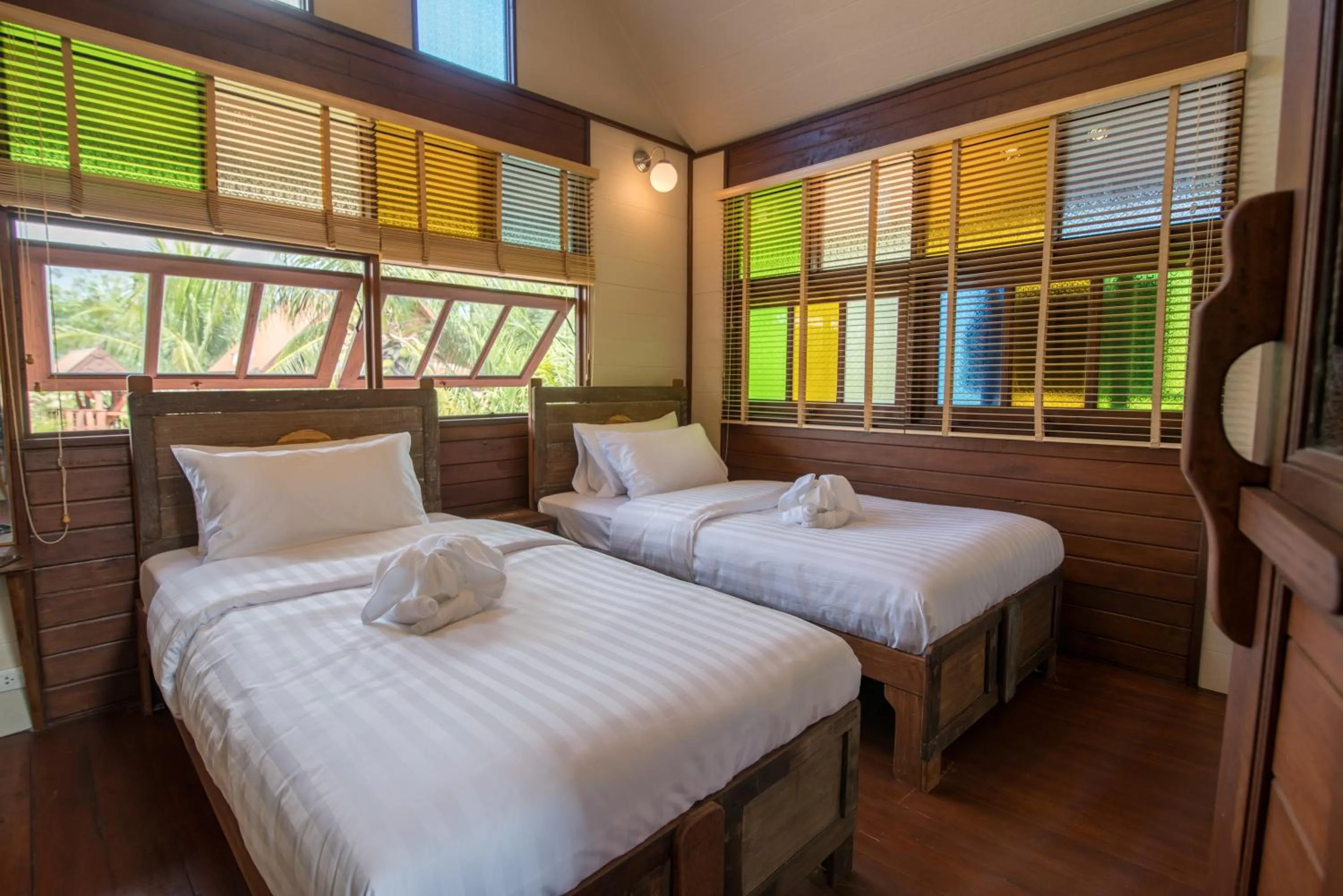 Bed in Suankaew Art Cottage