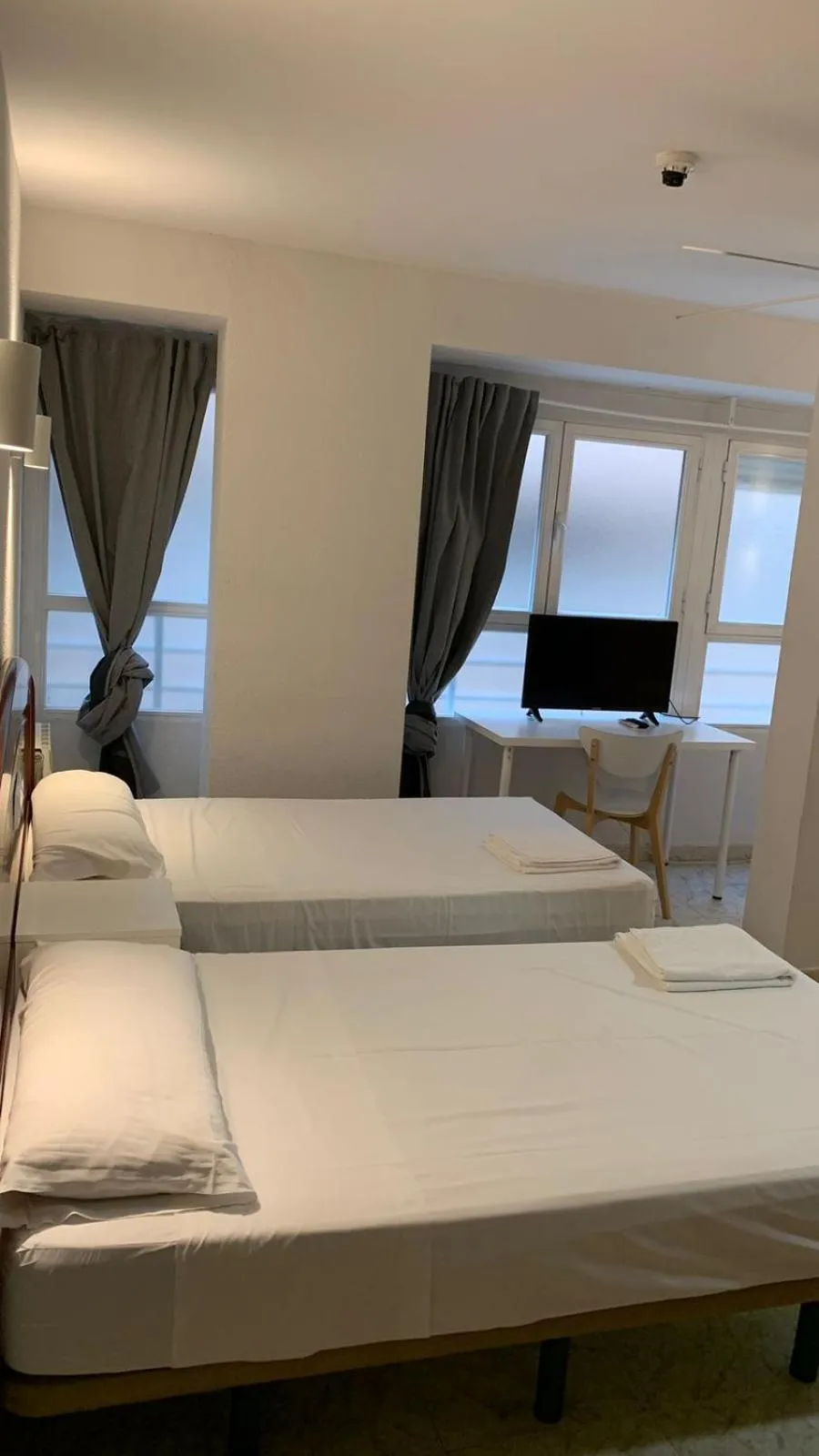 Bed in Hostal la Embajada