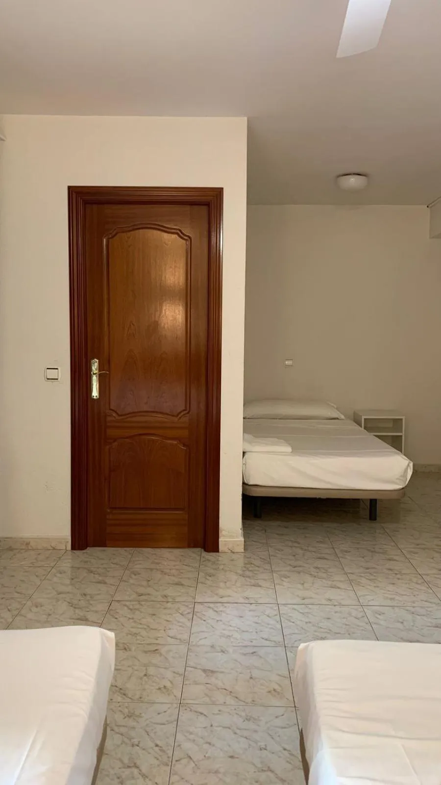 Bed in Hostal la Embajada