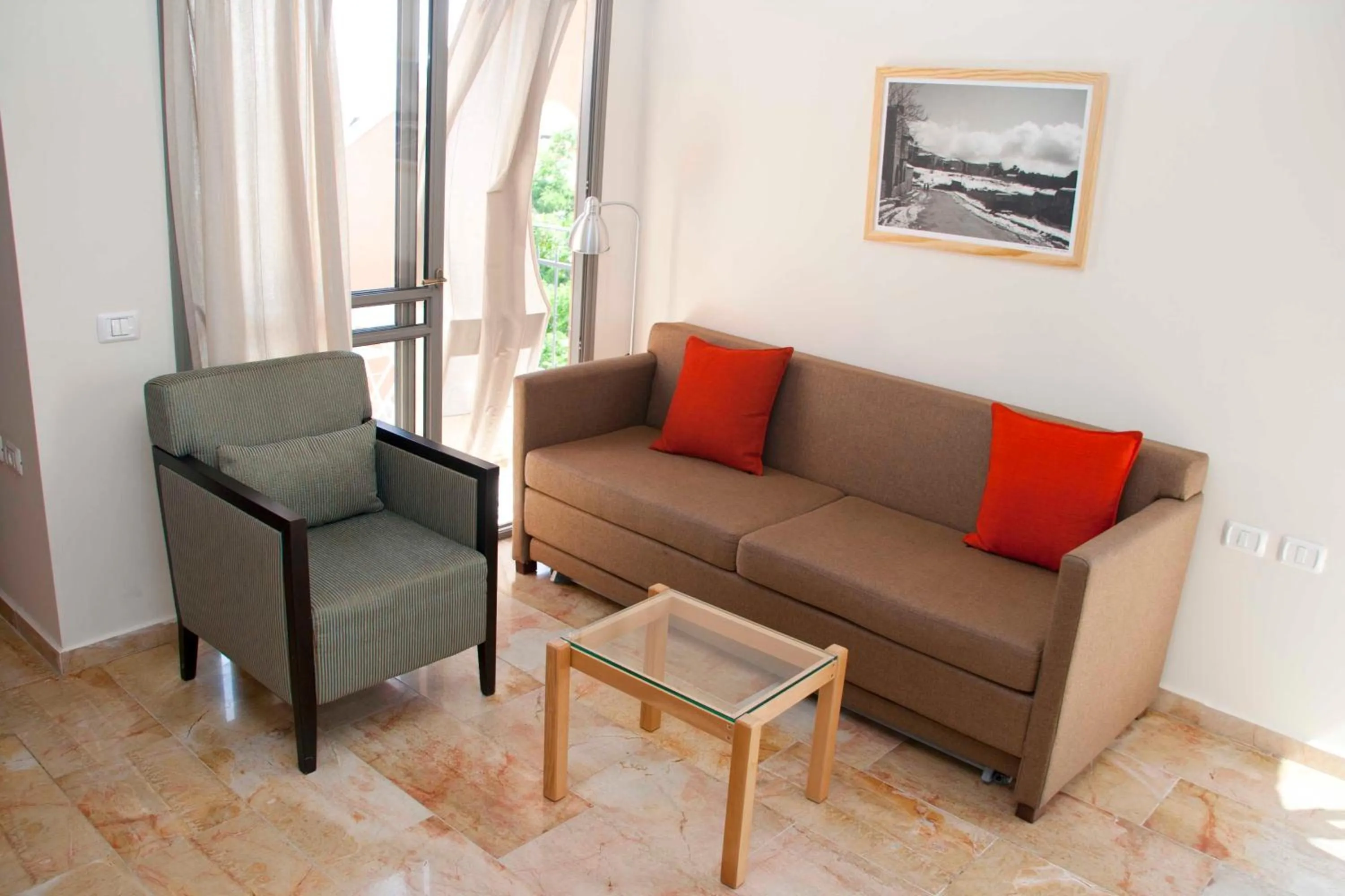 Bed in The Market Courtyard - Suites Hotel