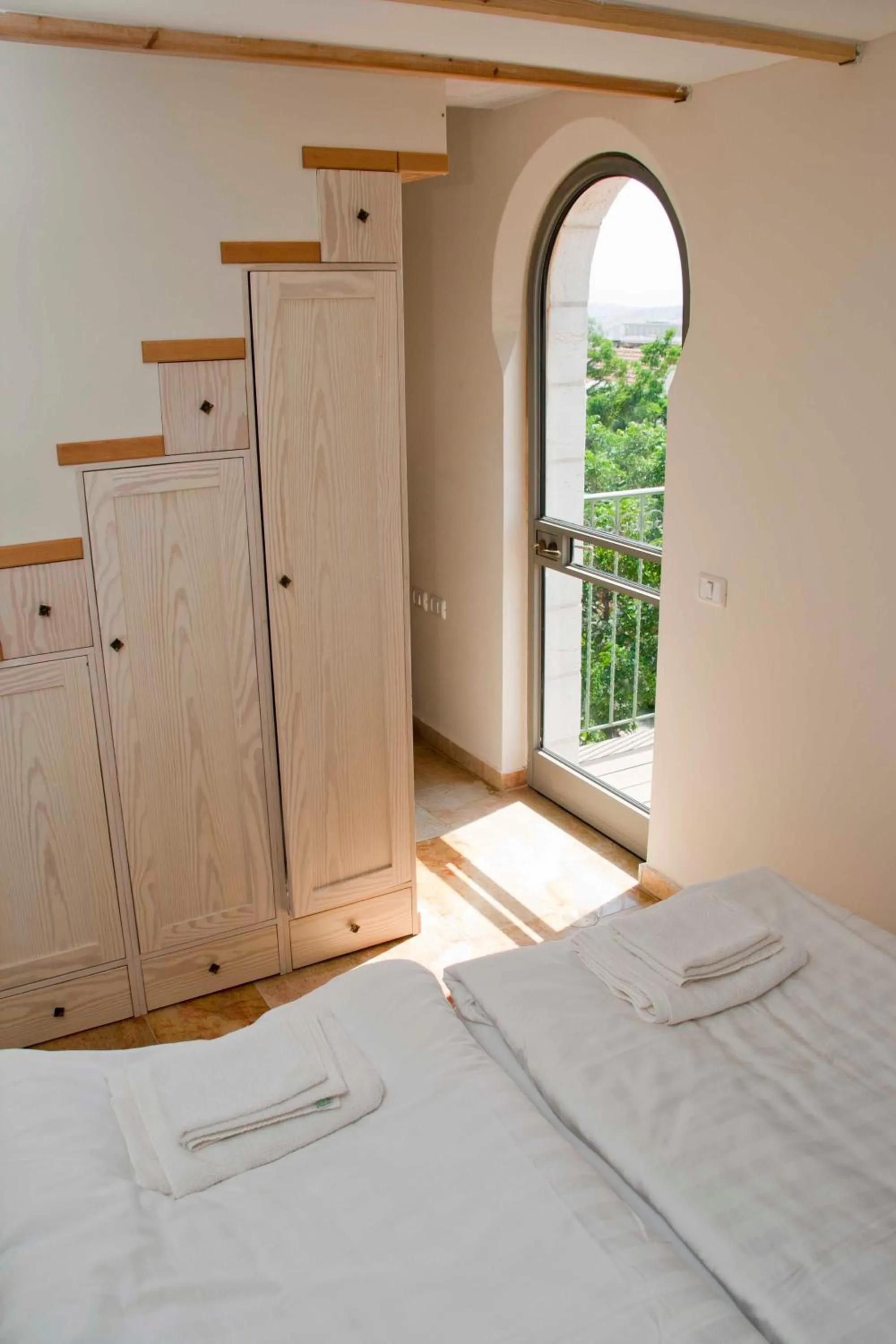 Bed in The Market Courtyard - Suites Hotel