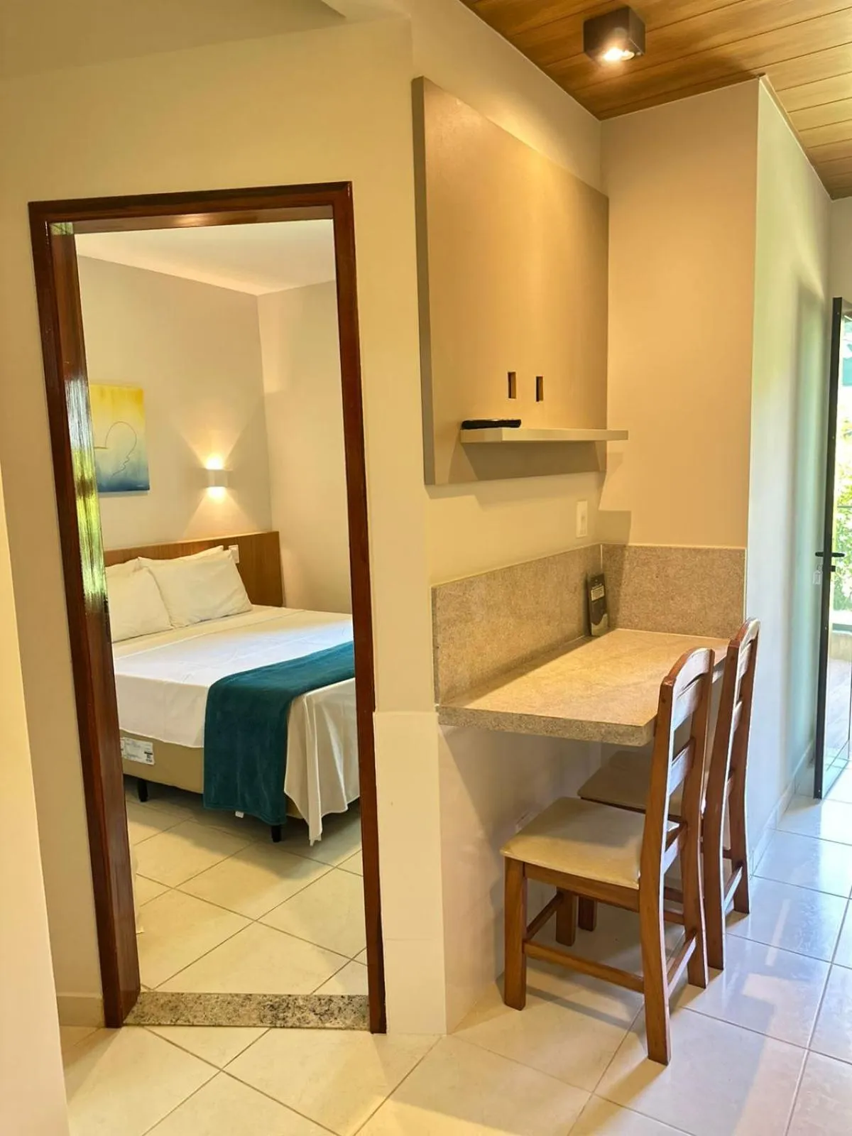 Living room, Bed in Ilheus North Hotel