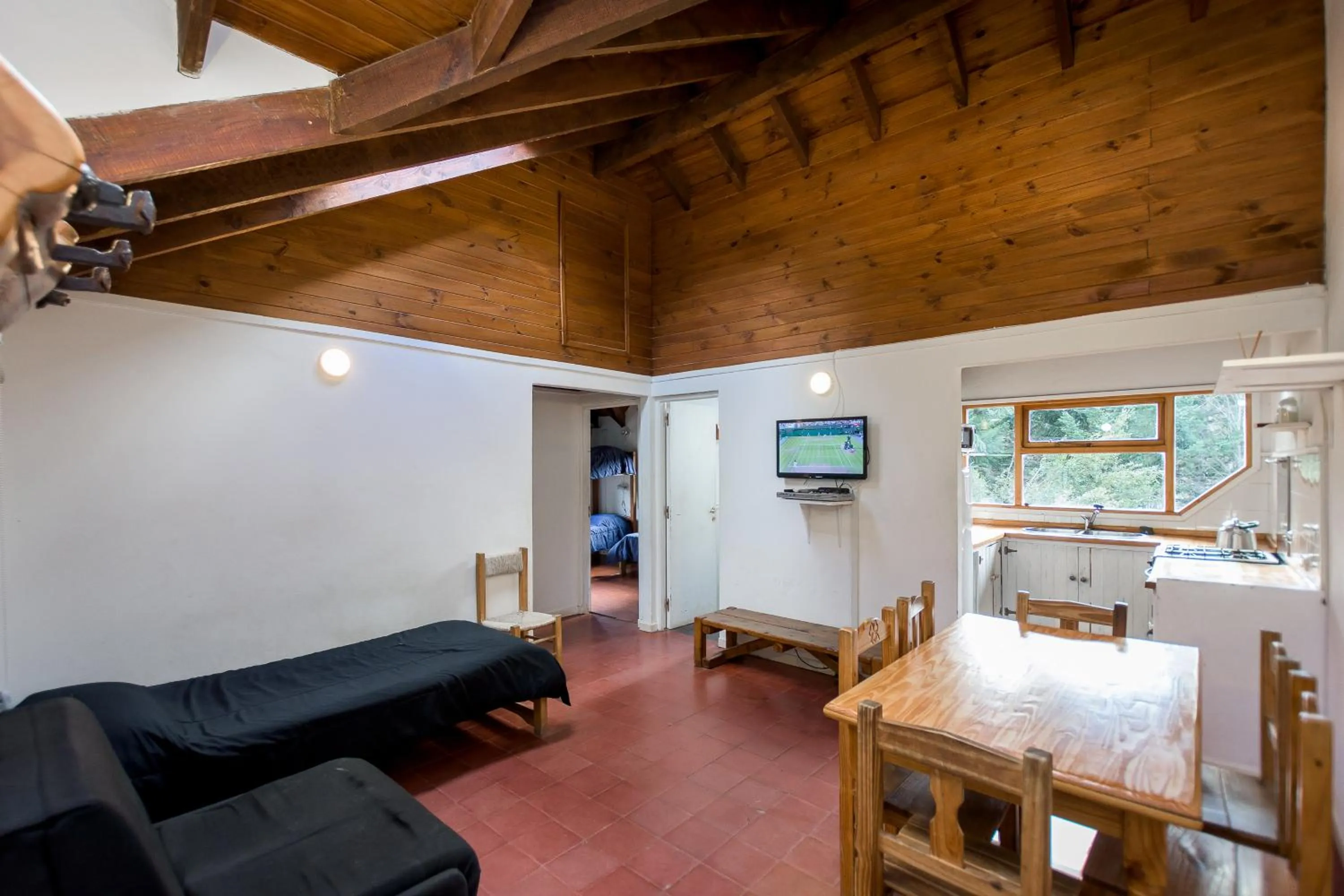 Communal lounge/ TV room in Hostel La Angostura