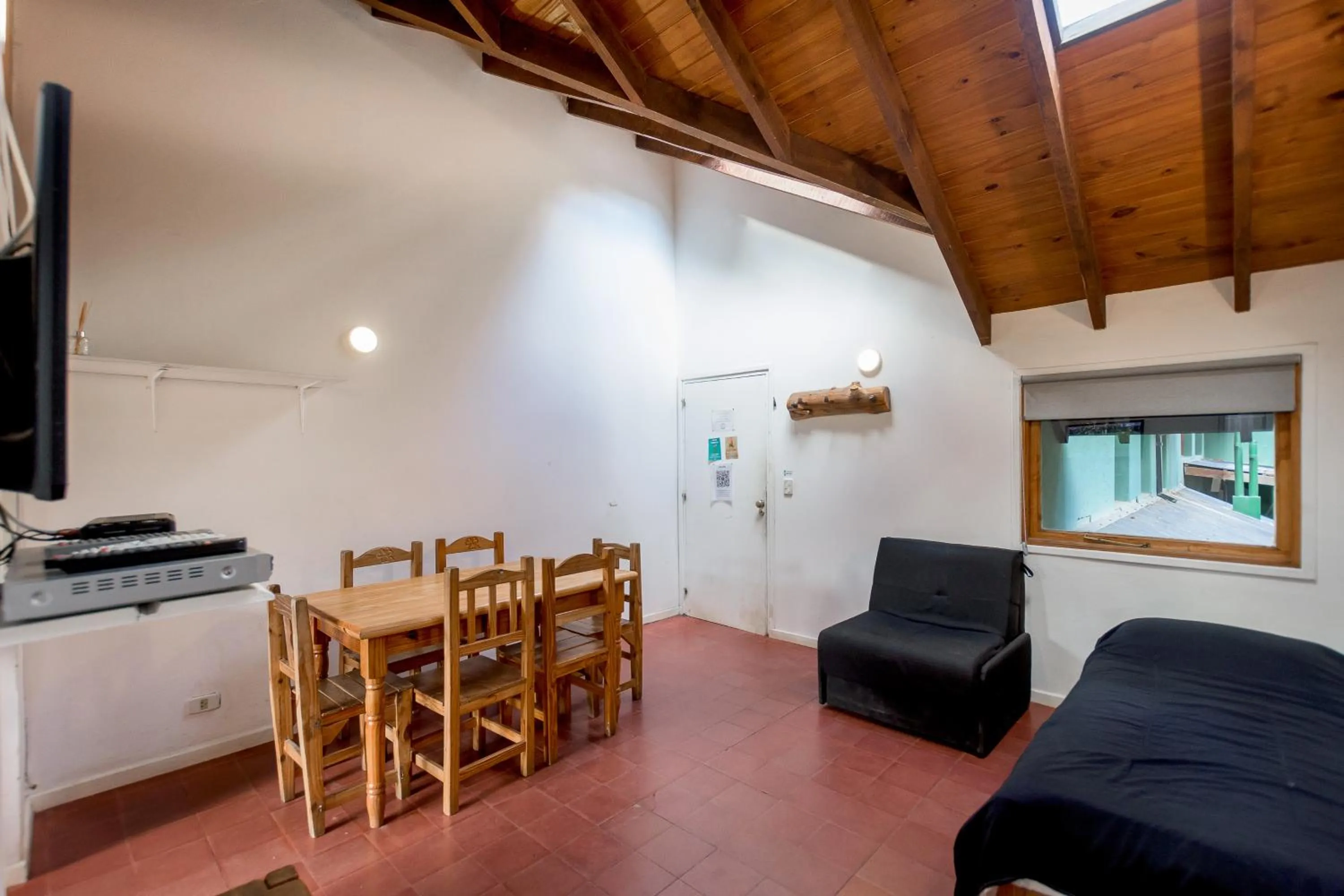 Communal lounge/ TV room in Hostel La Angostura