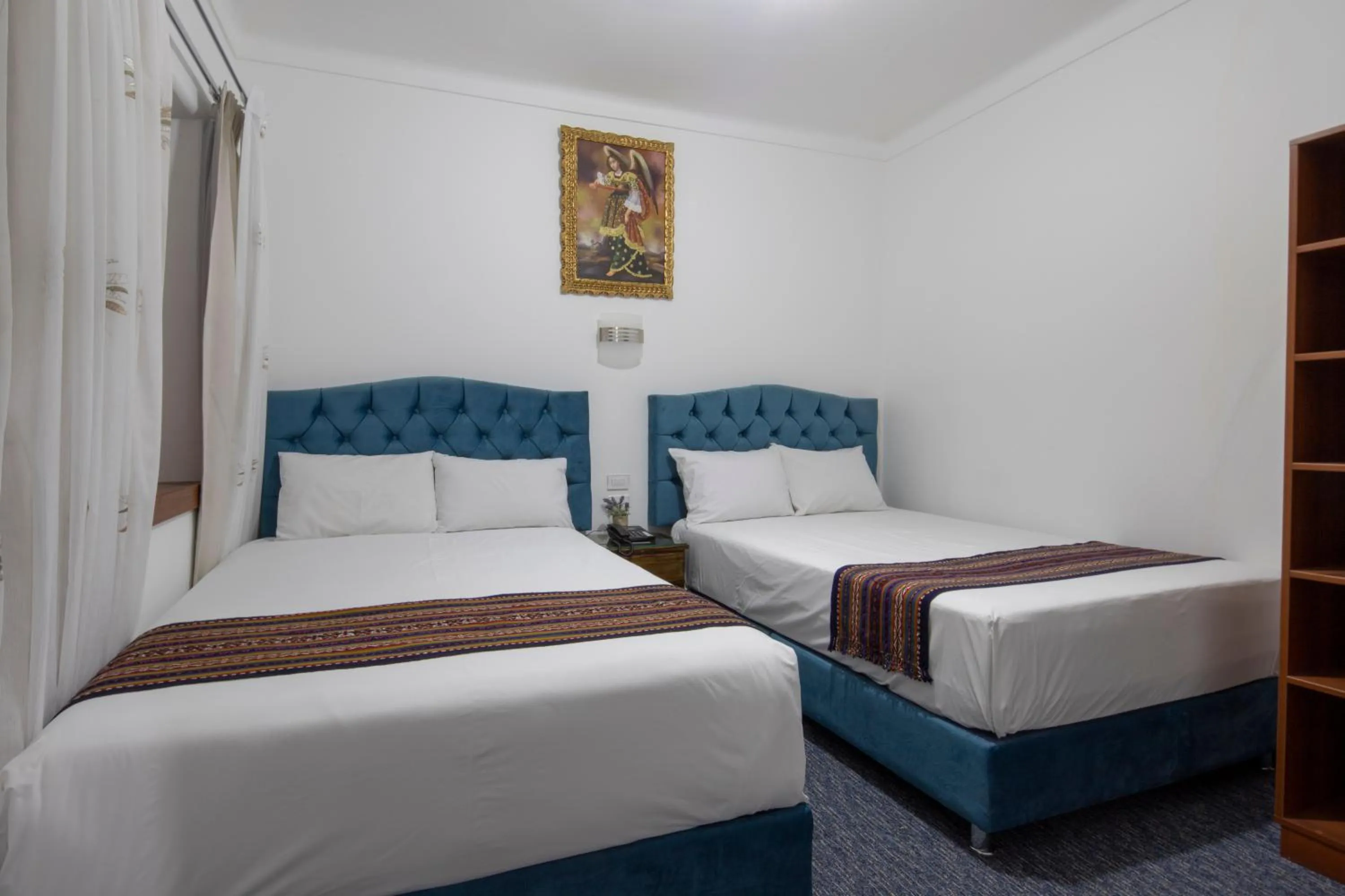 Bed in Hotel Rojas Inn