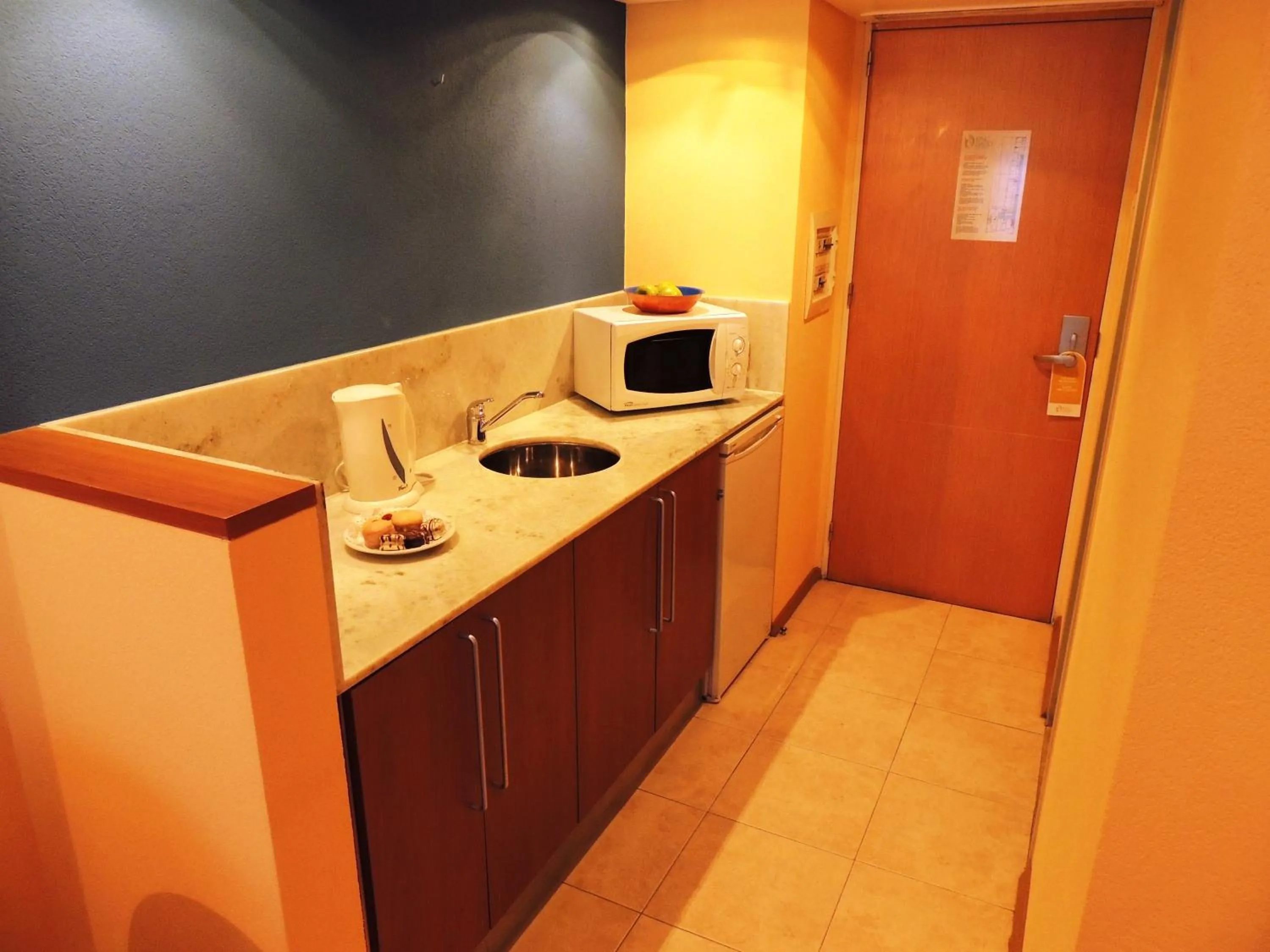 Kitchen or kitchenette in King David Flat Hotel - Argentina