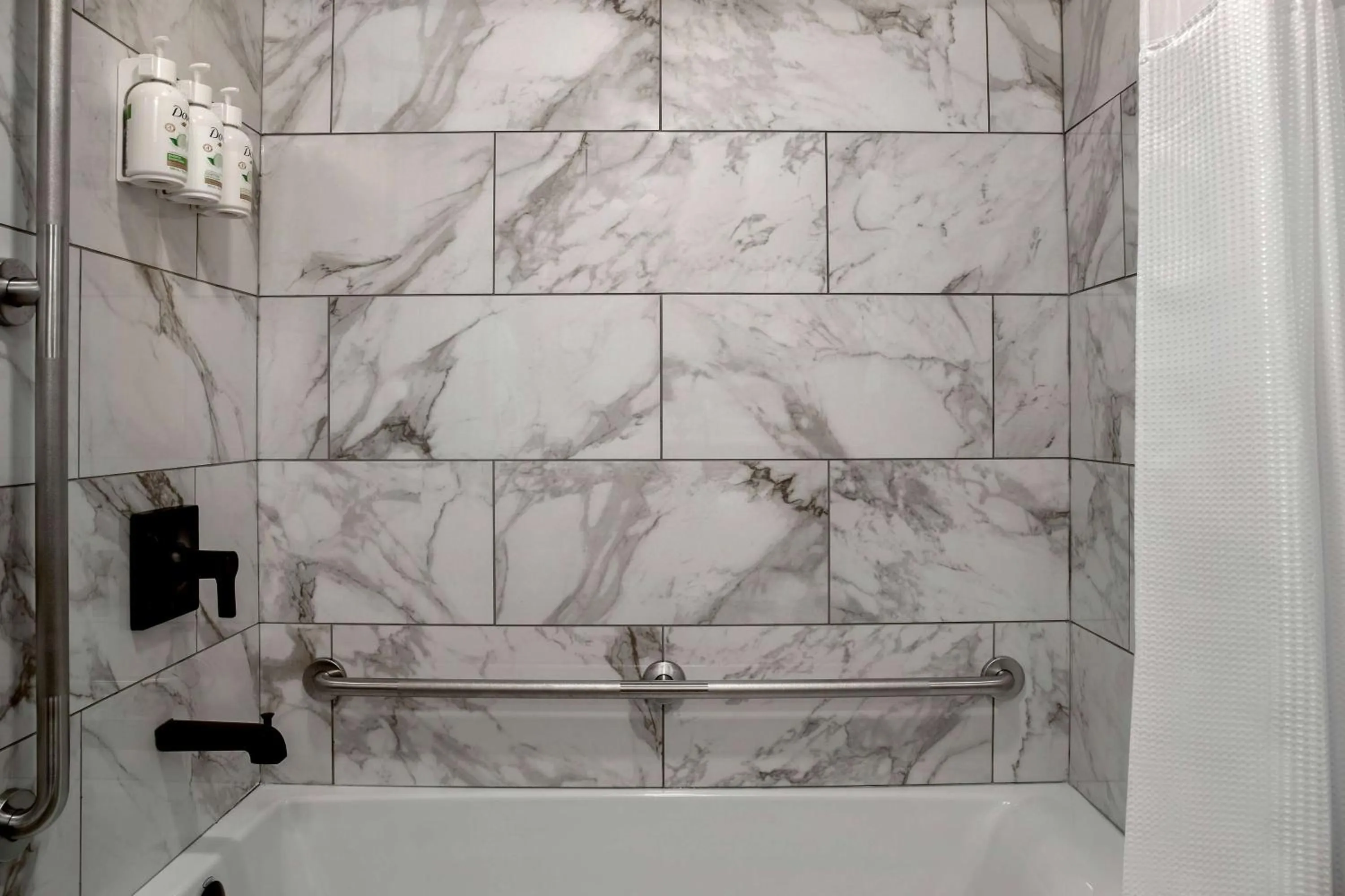 Bathroom in Ramada by Wyndham Cochrane