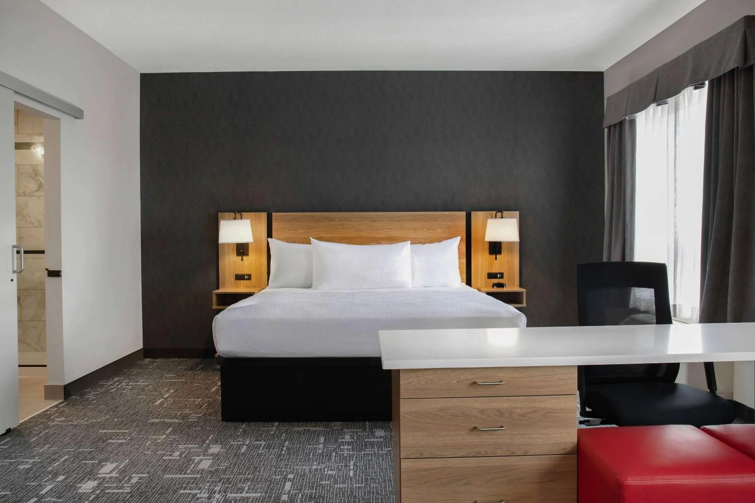 Bed in Ramada by Wyndham Cochrane