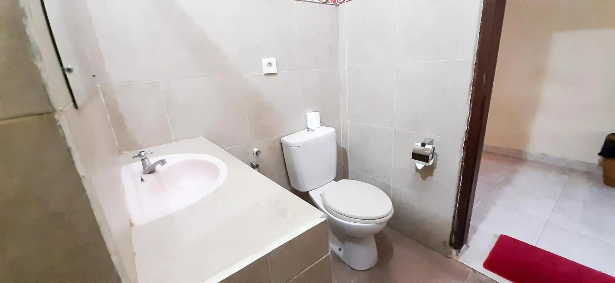 Bathroom in Bali Bhuana Beach Cottages