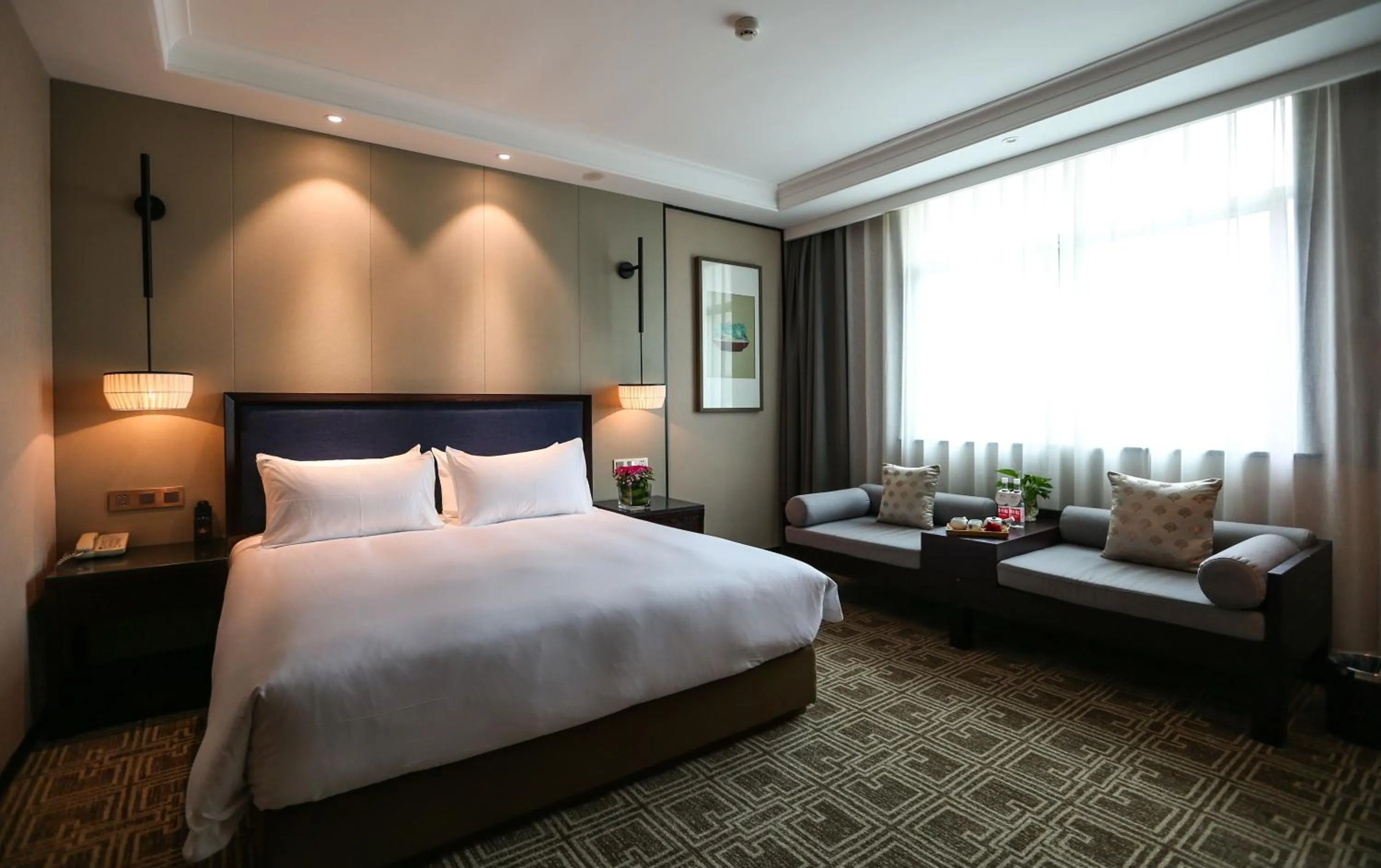 Bed in Yiwu Kasion Purey Hotel