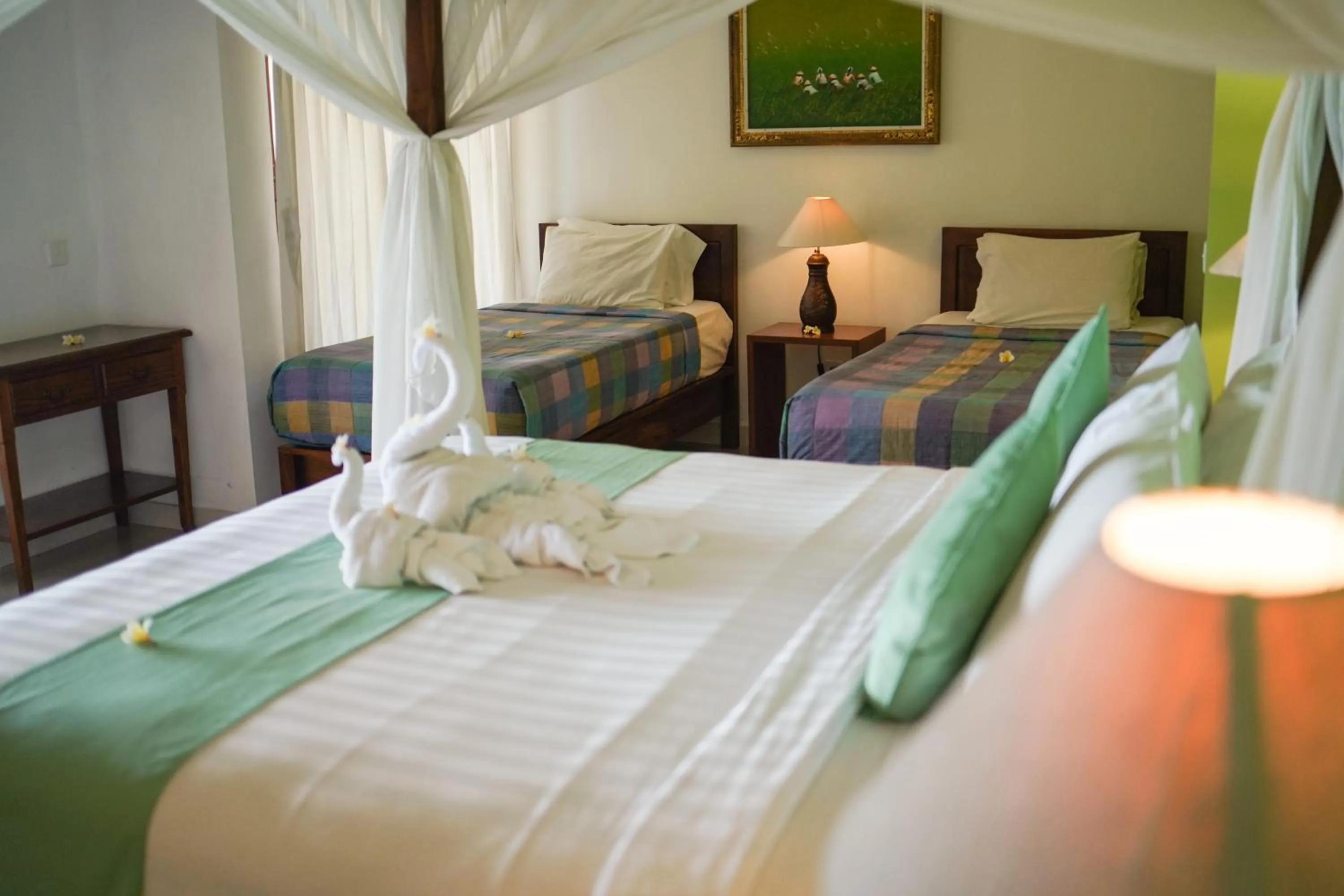 Bed in Apa Kabar Villas