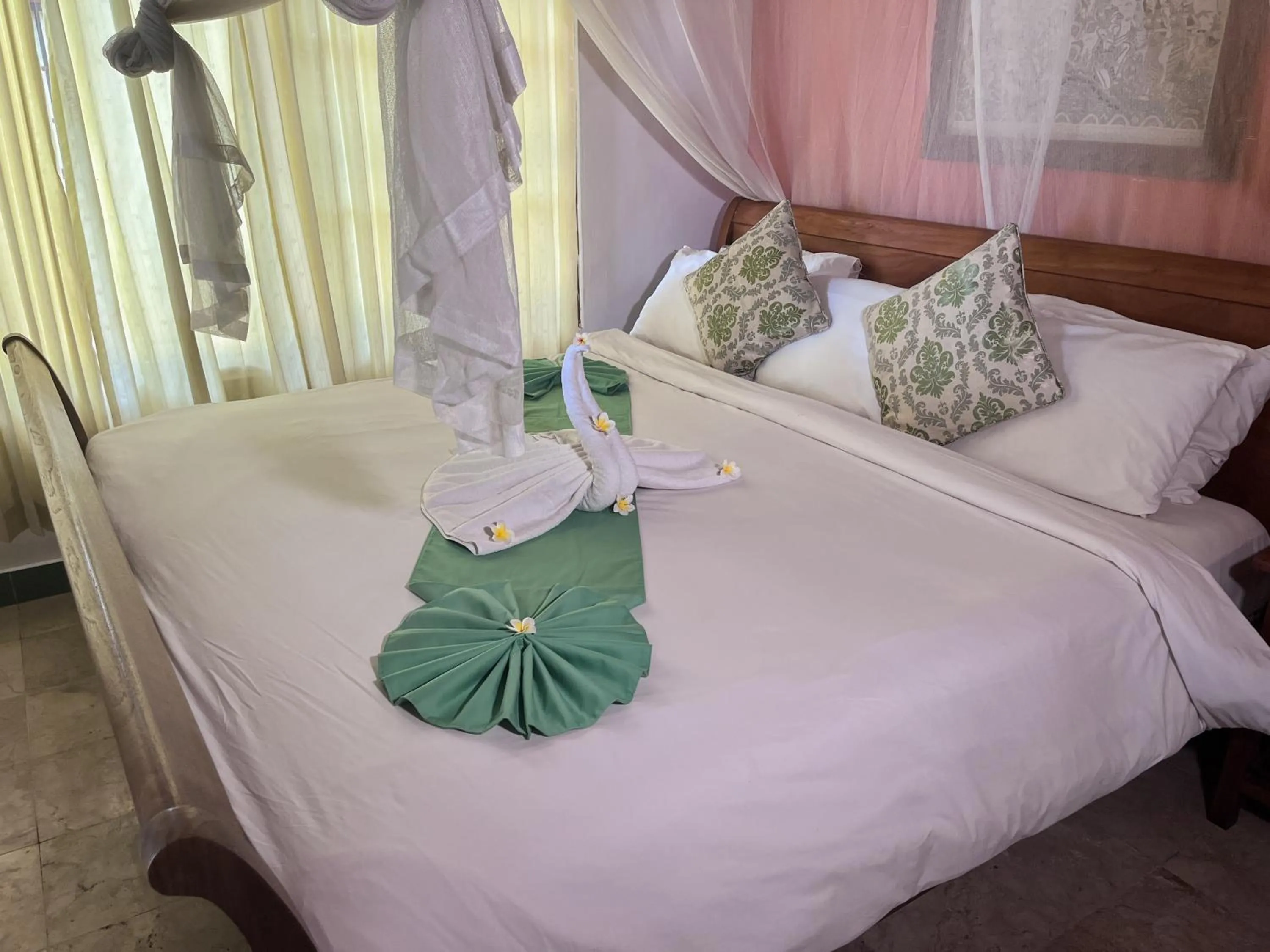 Bed in Apa Kabar Villas