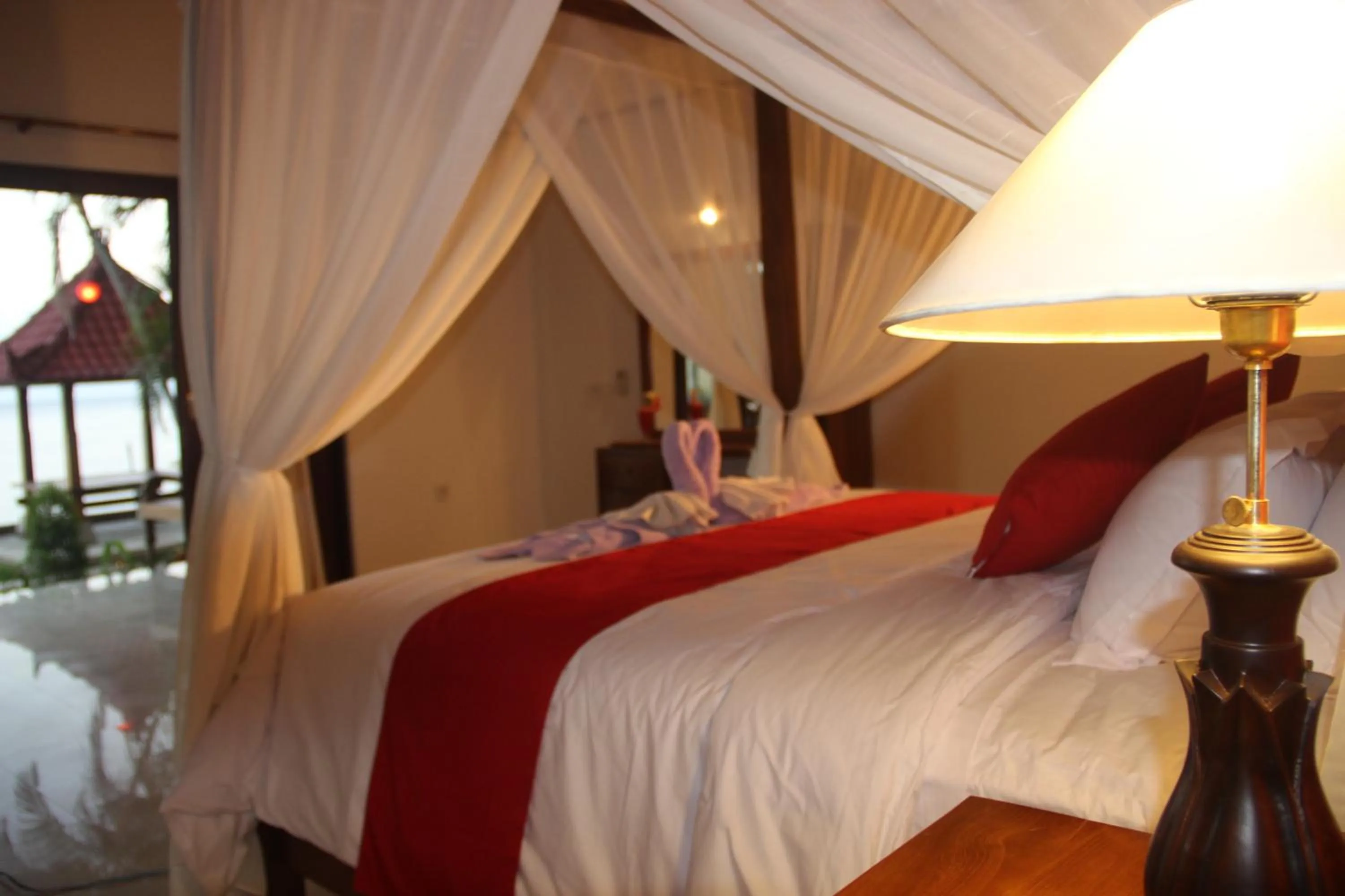 Bed in Apa Kabar Villas