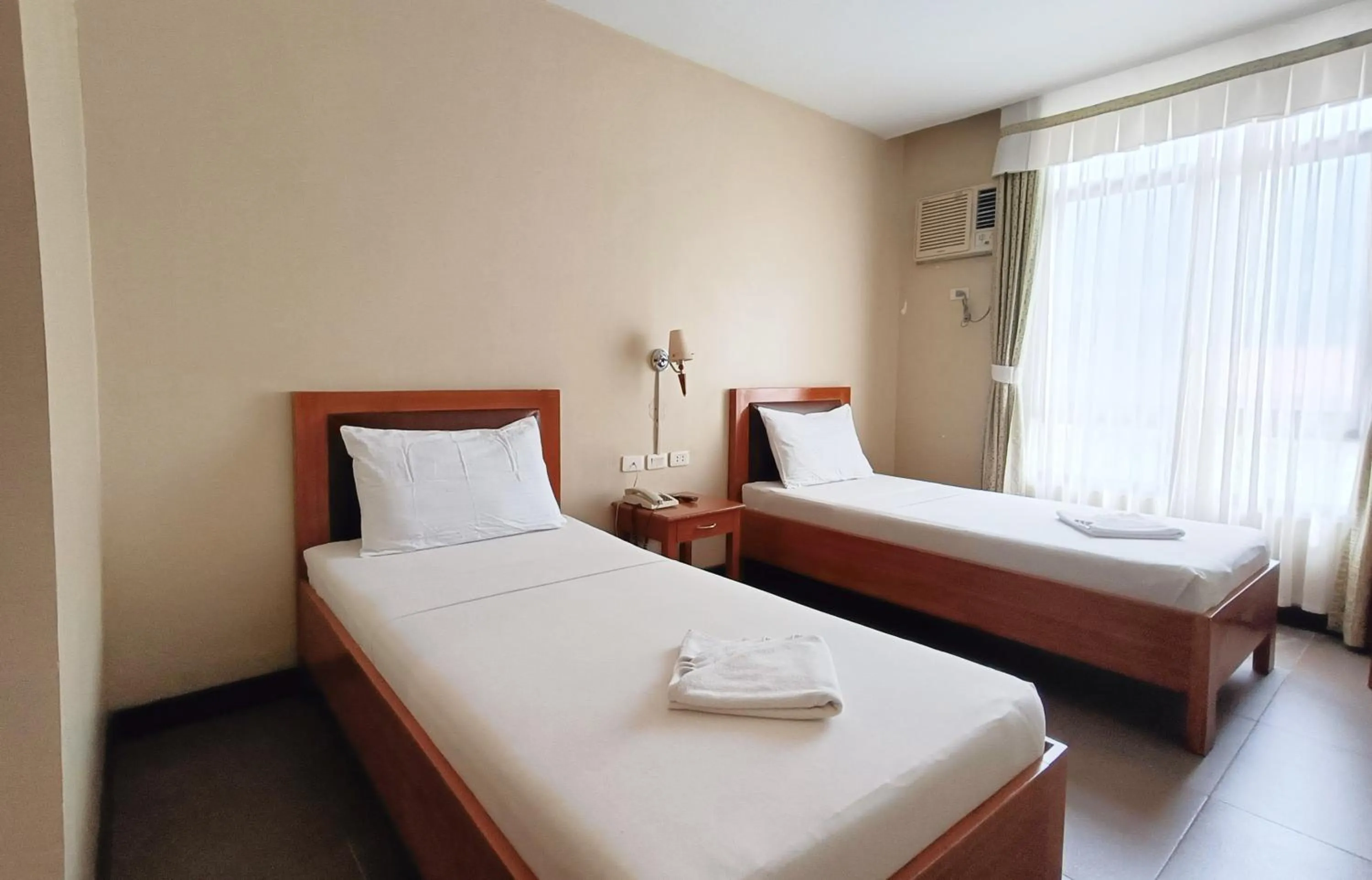 Bed in Fuente Oro Business Suites Cebu