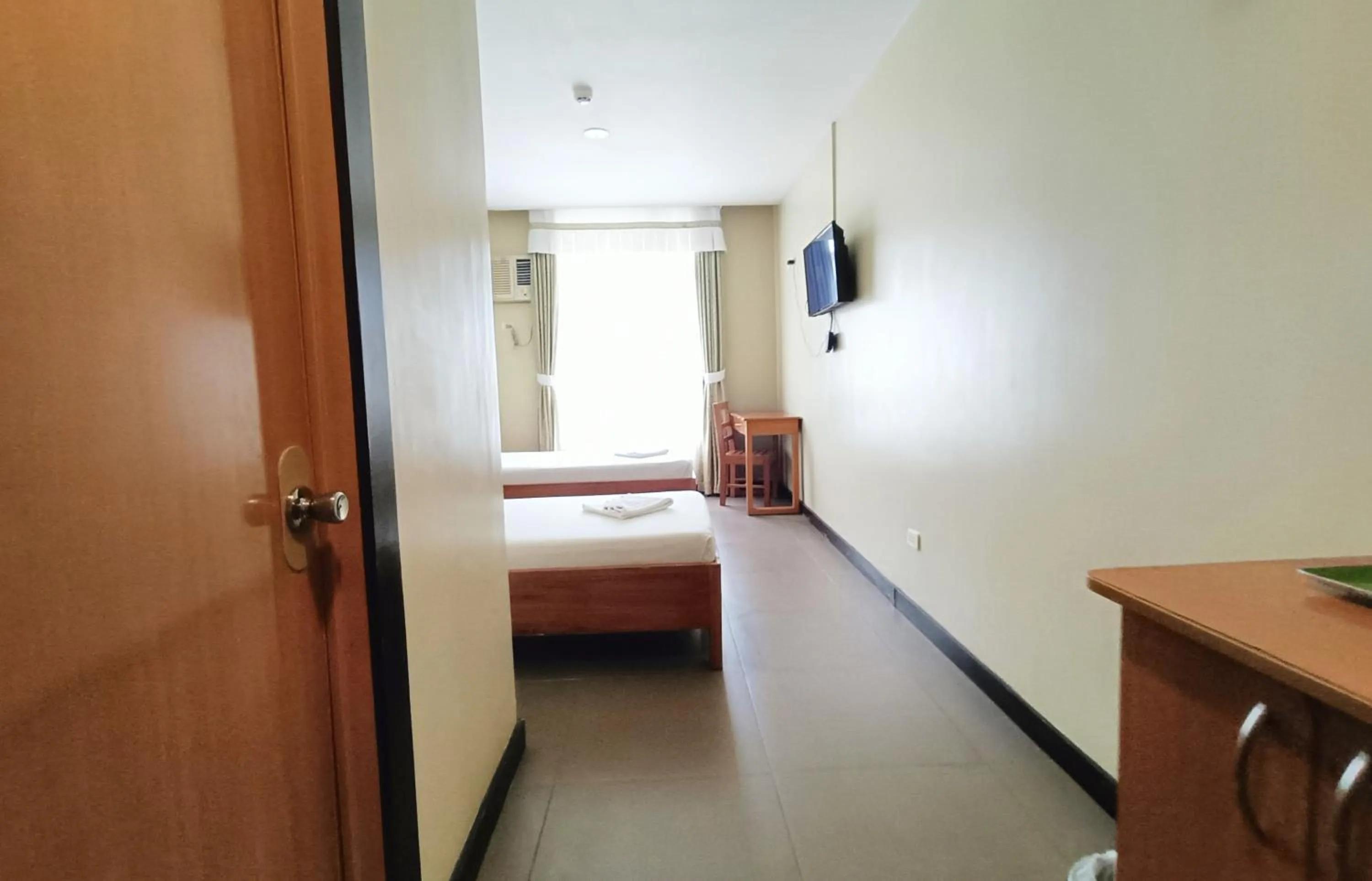 Bed in Fuente Oro Business Suites Cebu