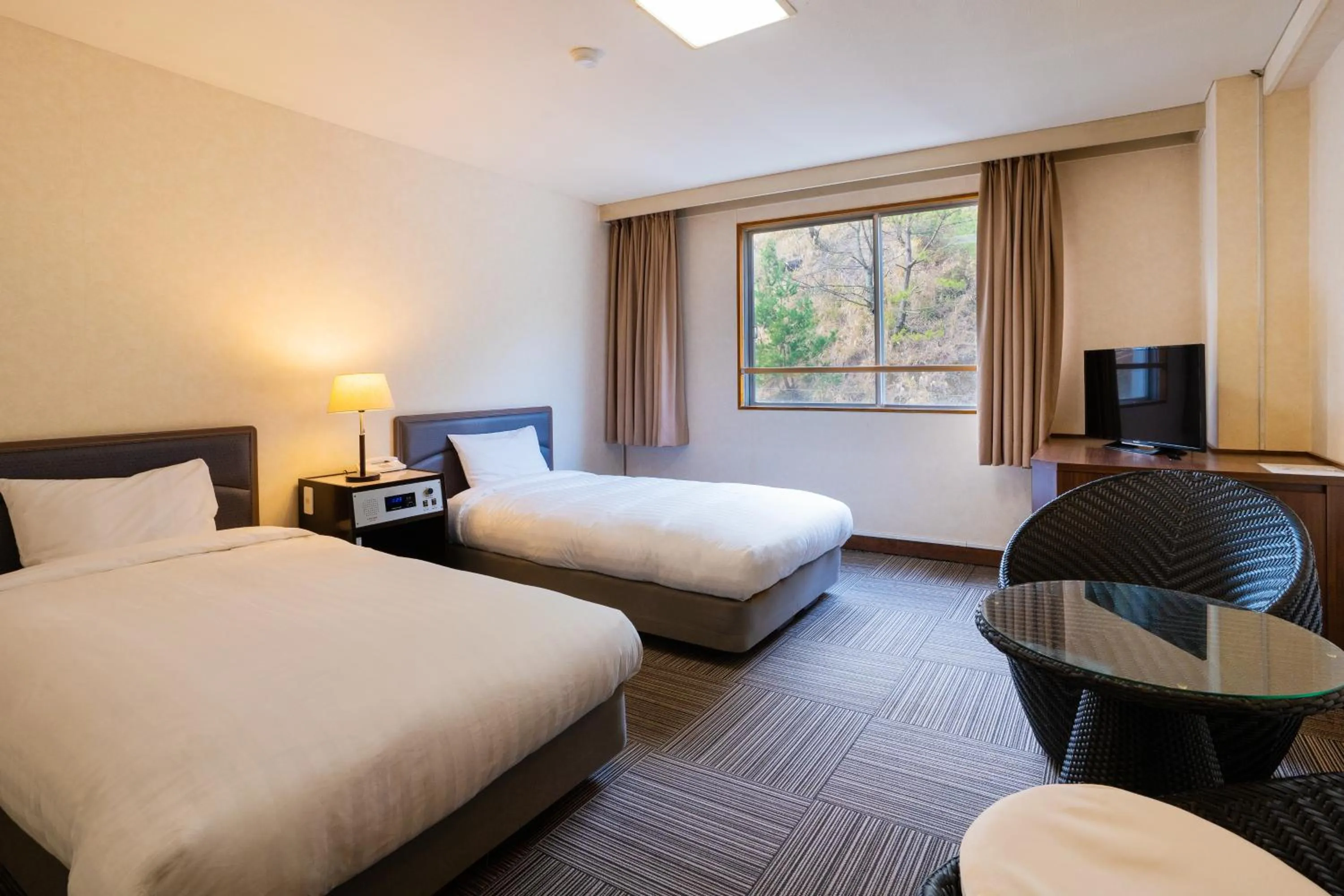 Photo of the whole room, Bed in Kirishima Kokusai Hotel