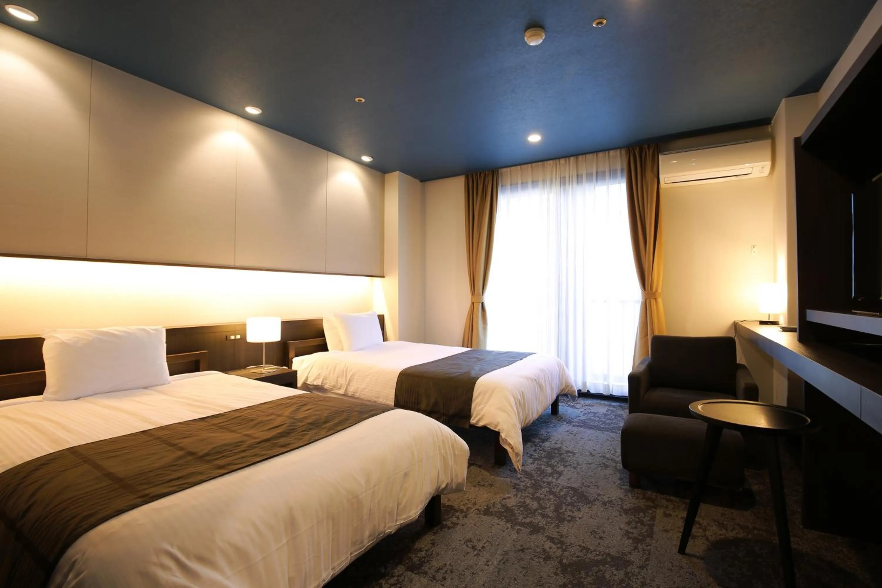 Bed in Kirishima Kanko Hotel